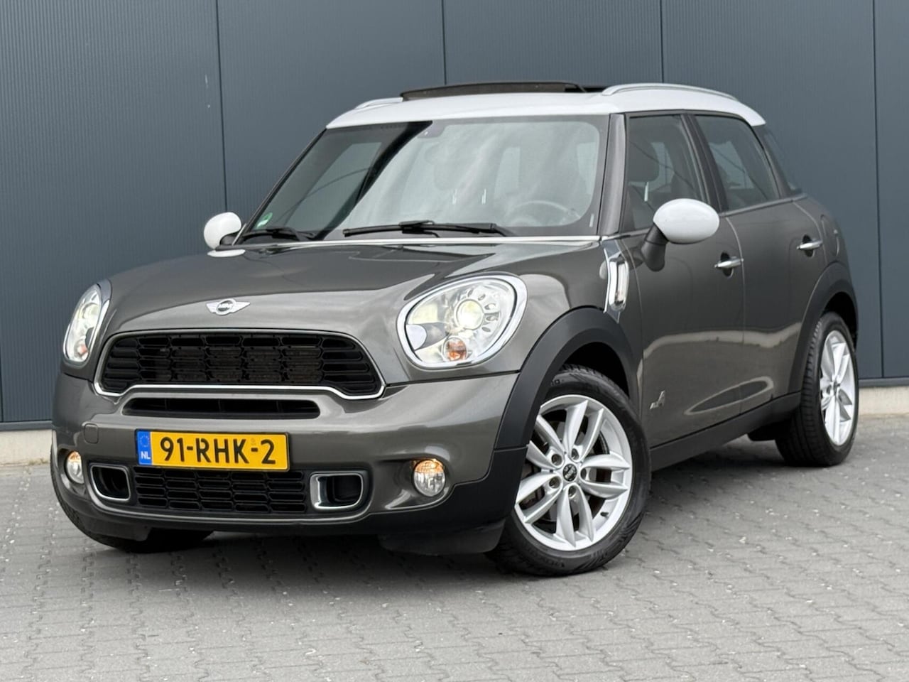 MINI Countryman - 1.6 Cooper S ALL4 Pano - Xenon - Navi - Leder - AutoWereld.nl