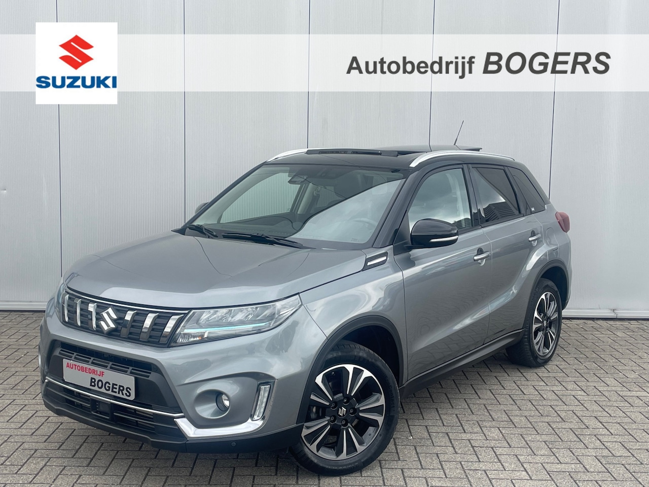 Suzuki Vitara - 1.4 Boosterjet Style Smart Hybrid Navigatie, Schuifdak, Half Leder, 17"Lm, Climate Control - AutoWereld.nl