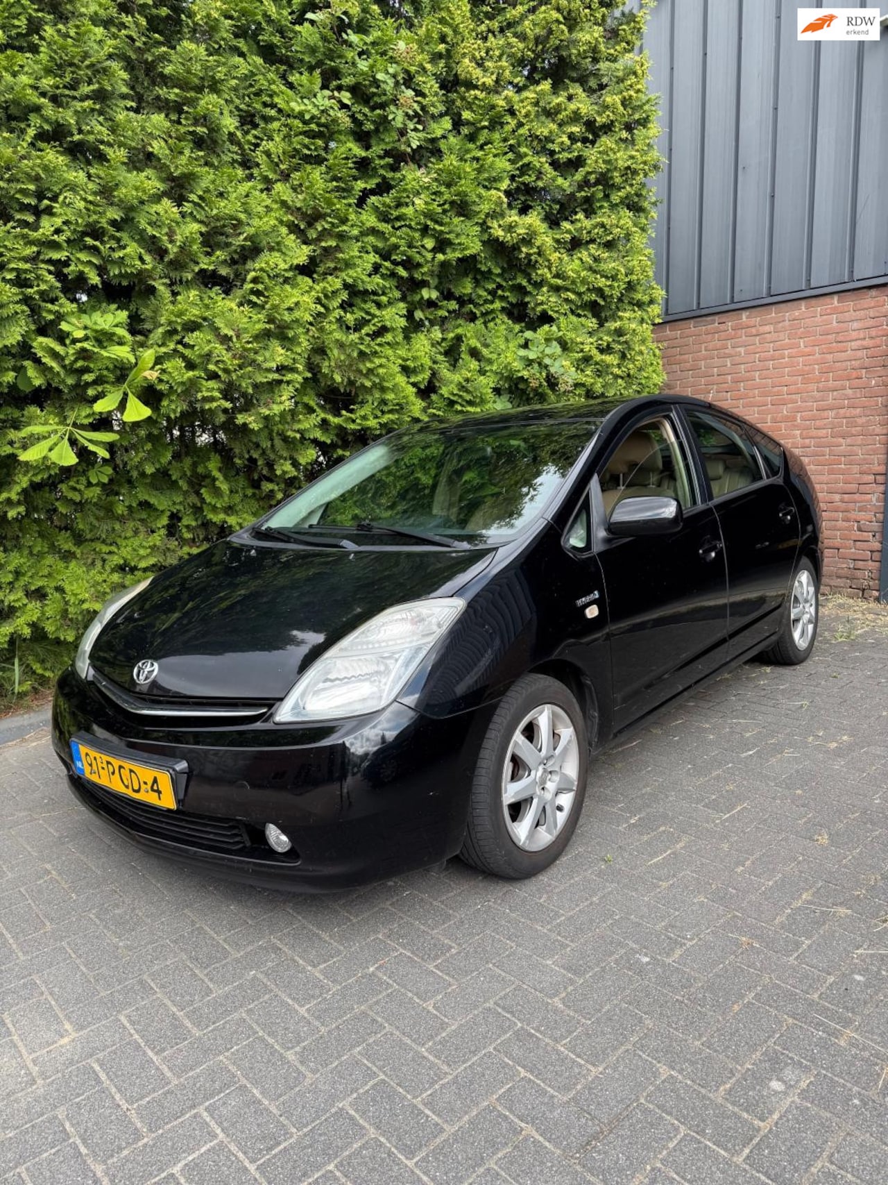 Toyota Prius - 1.5 VVT-i Business Edition 1.5 VVT-i Business Edition,Navi,Leder,Clima,Camera,Cruise control - AutoWereld.nl