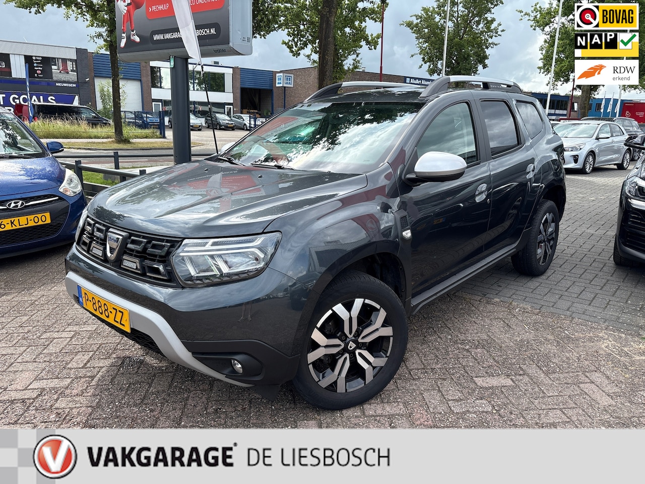 Dacia Duster - 1.3 TCe Prestige 1.3 TCe Prestige,navi,leer,,camera.afn trekhaak,stoelverw,orig ned. - AutoWereld.nl