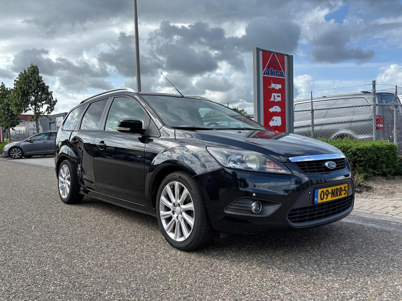 Ford Focus Wagon - 1.6 Comfort | Parkeersensoren | Navi | Airco | Cruise control | Trekhaak | Goed onderhoude - AutoWereld.nl