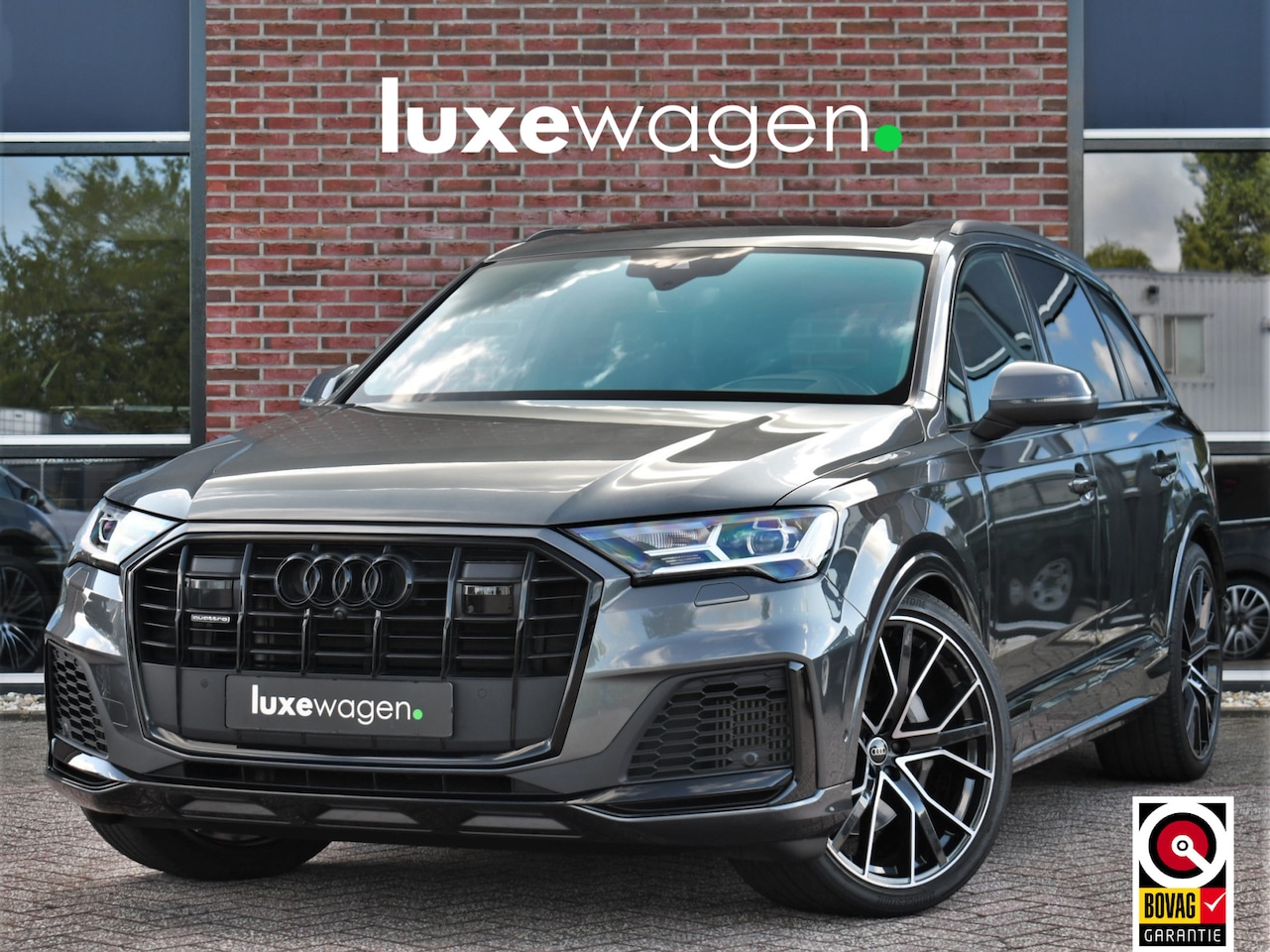 Audi Q7 - 55 TFSI quattro S-Line 7-pers Pano S-zetels Trekh ACC HUD B&O 360 Soft-close - AutoWereld.nl
