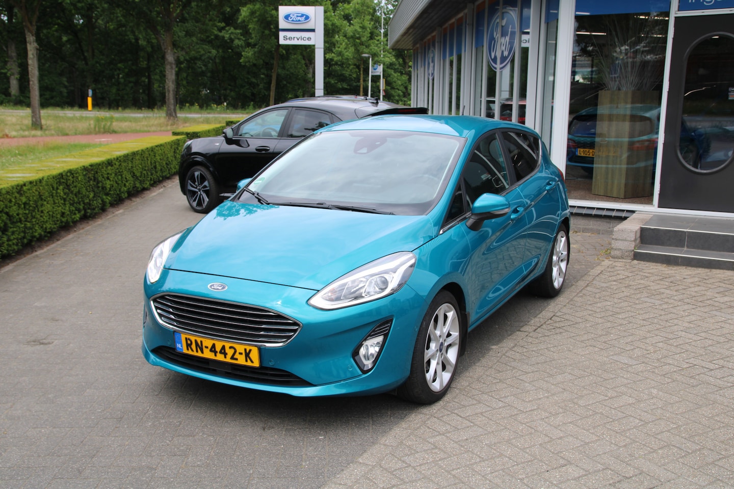 Ford Fiesta - 1.0 EcoBoost 100 PK Titanium TREKHAAK| NAVIGATIE| B&O PREMIUM AUDIO - AutoWereld.nl