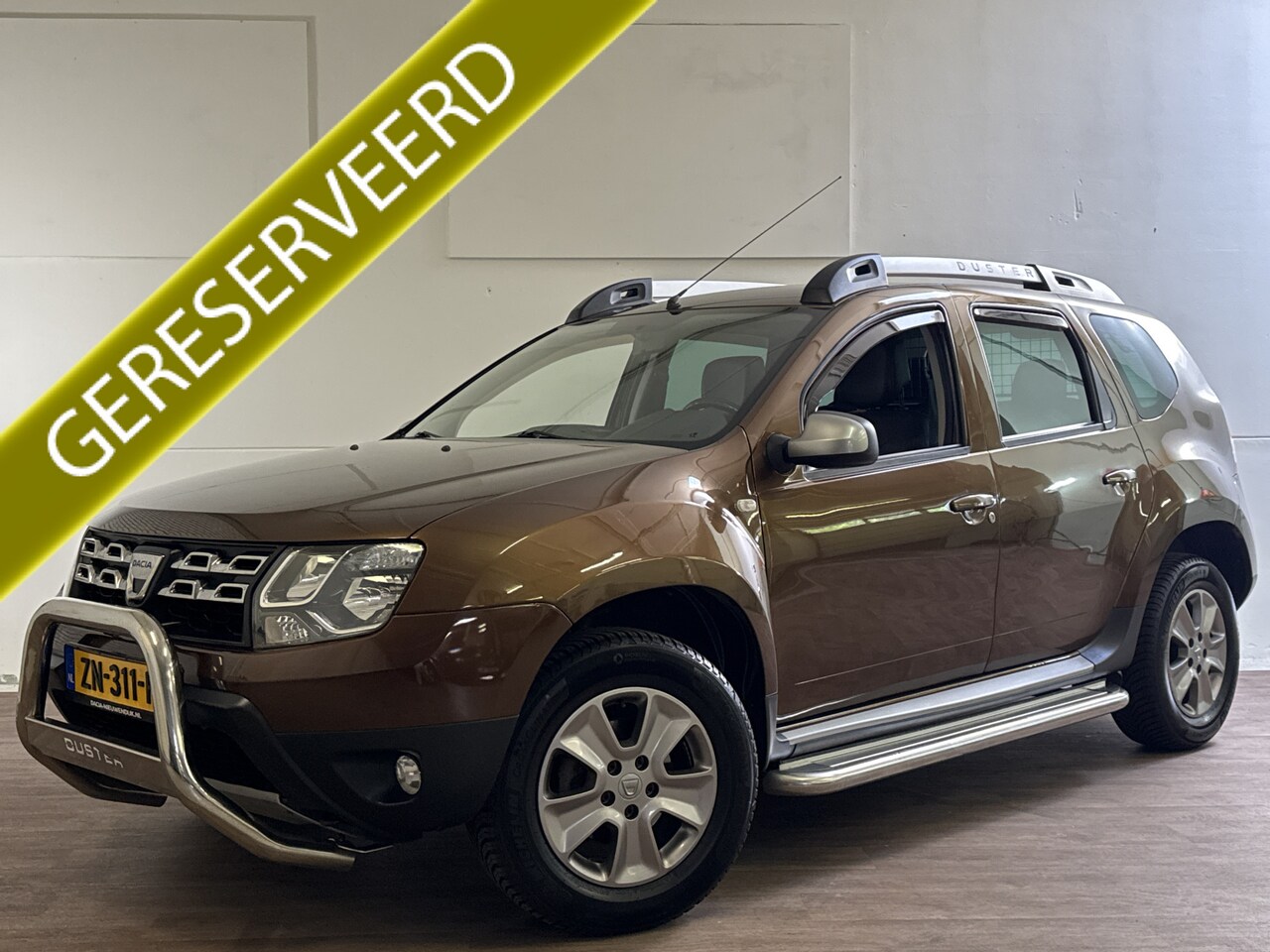 Dacia Duster - 1.2 TCe 4x2 PRESTIGE LEDER/NAVI/TREKHAAK - AutoWereld.nl