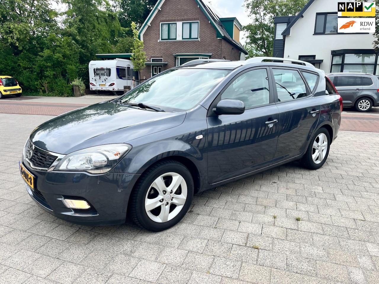 Kia Cee'd Sporty Wagon - 1.4 CVVT Seven Ecc Navi Isofix LM NAP - AutoWereld.nl