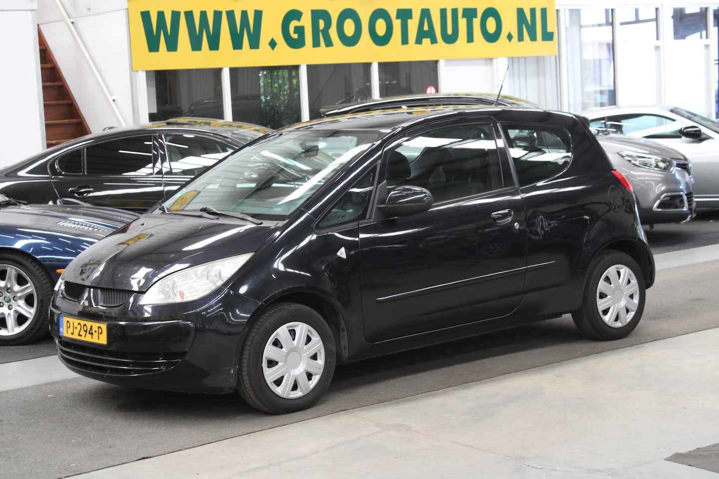 Mitsubishi Colt - 1.3 Incharge Airco, Stuurbekrachtiging, Navigatie systeem - AutoWereld.nl
