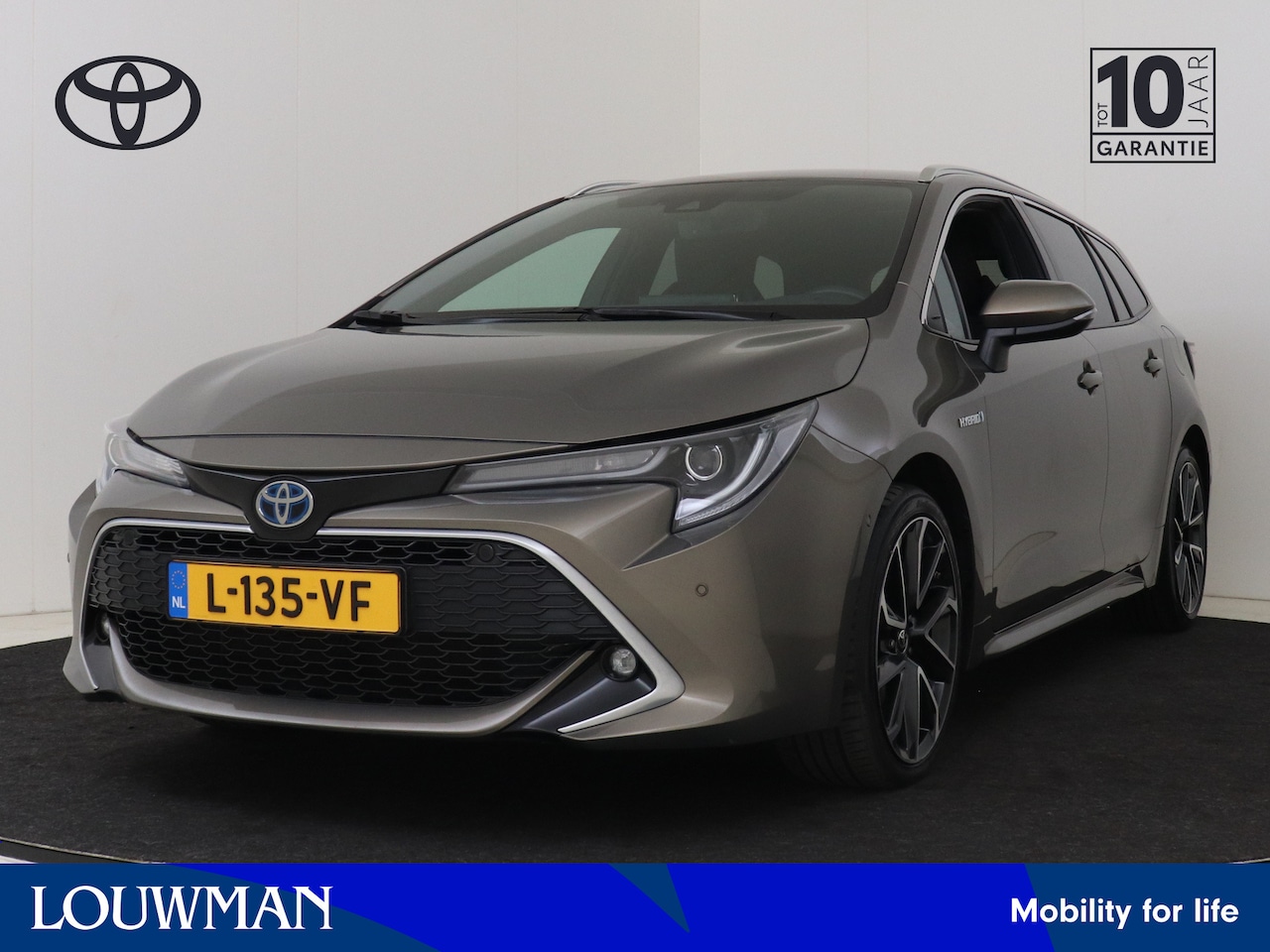 Toyota Corolla Touring Sports - 2.0 Hybrid Executive I Navigatie I Climate Control I Cruise Control I Camera I Stoelverwar - AutoWereld.nl