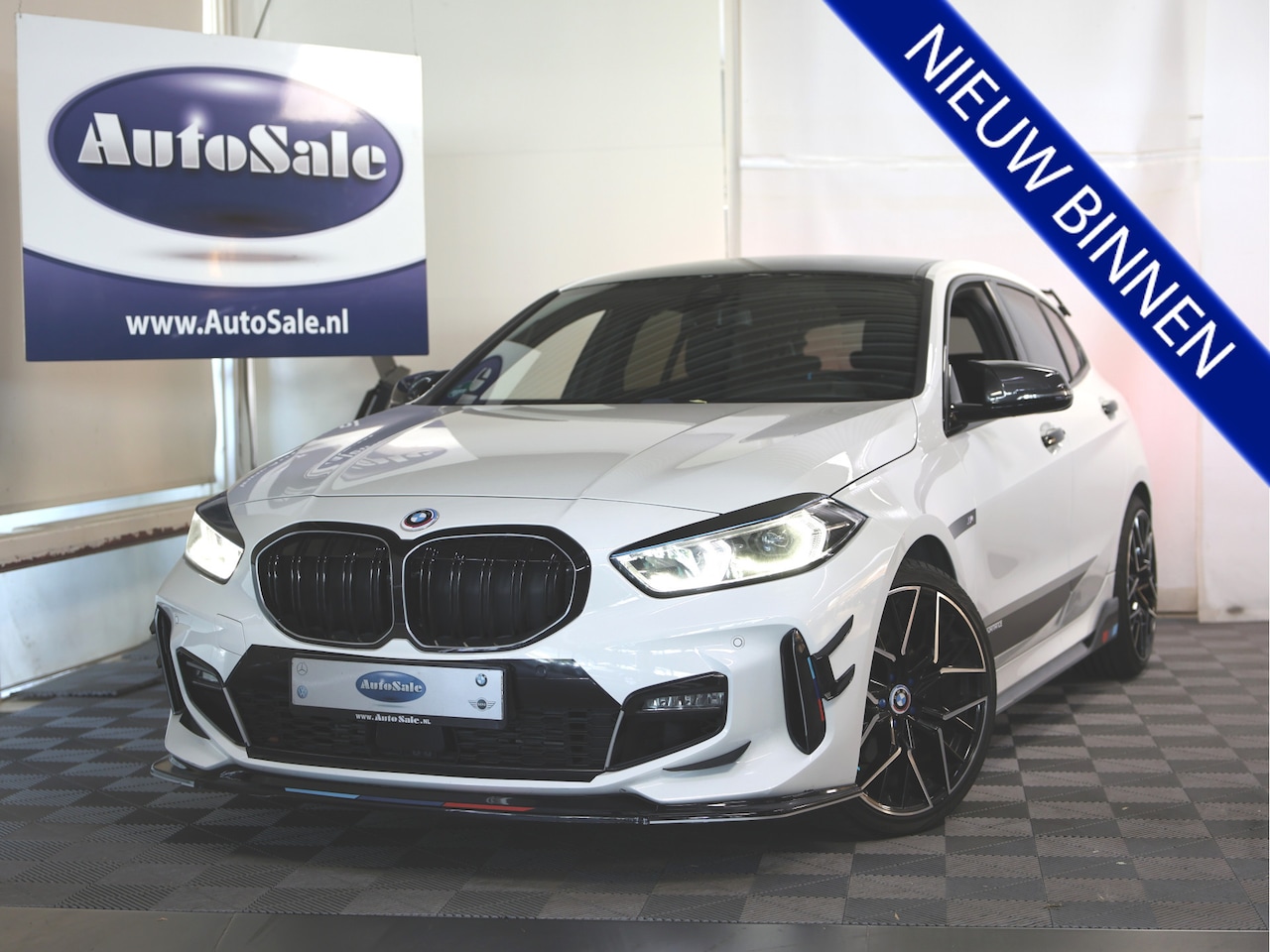 BMW 1-serie - 118i High Executive M Performance H&K '20 - AutoWereld.nl