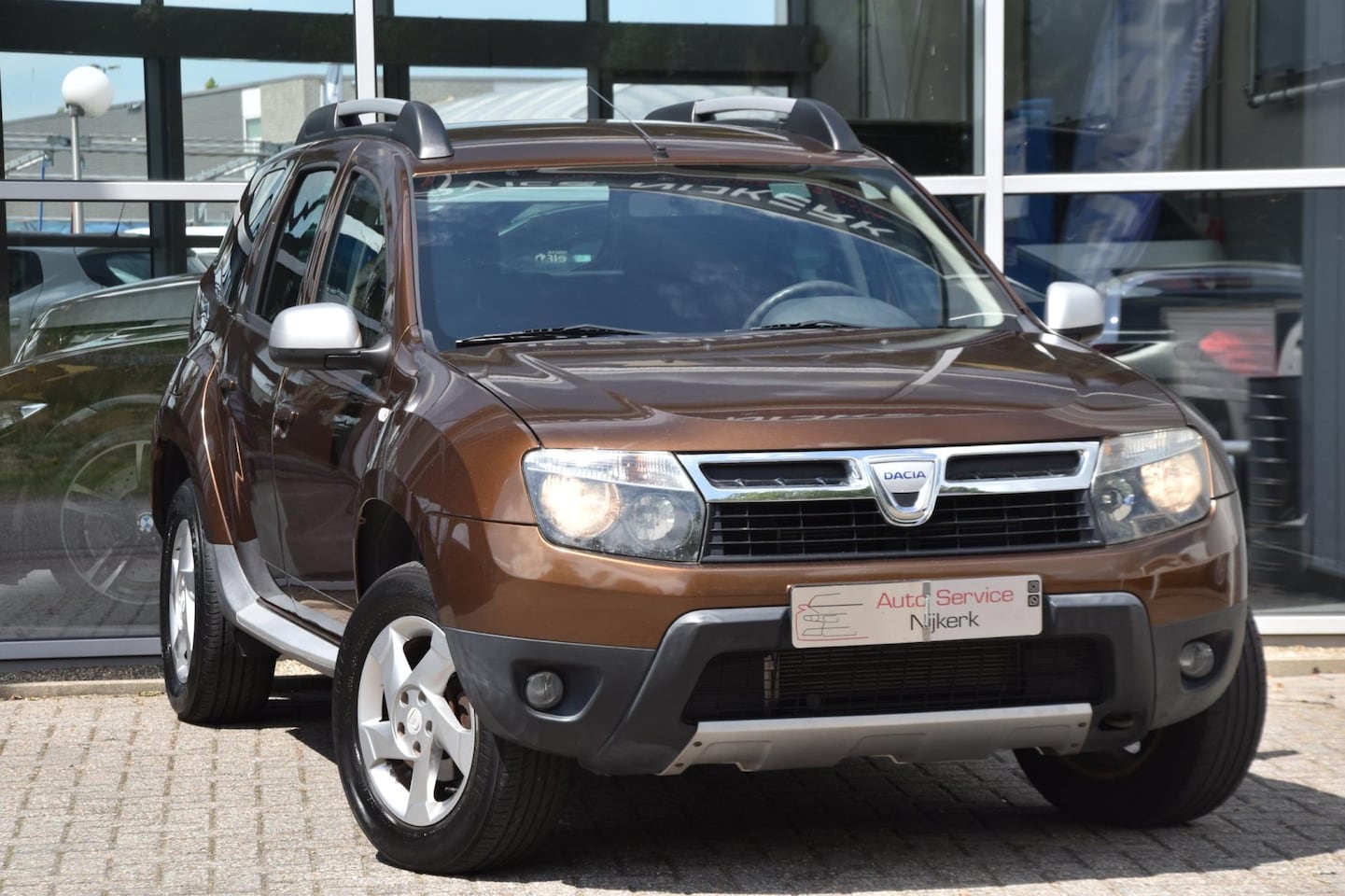 Dacia Duster - 1.6 Lauréate Airco Pdc Trekhaak Youngtimer 1ste Eigenaar - AutoWereld.nl