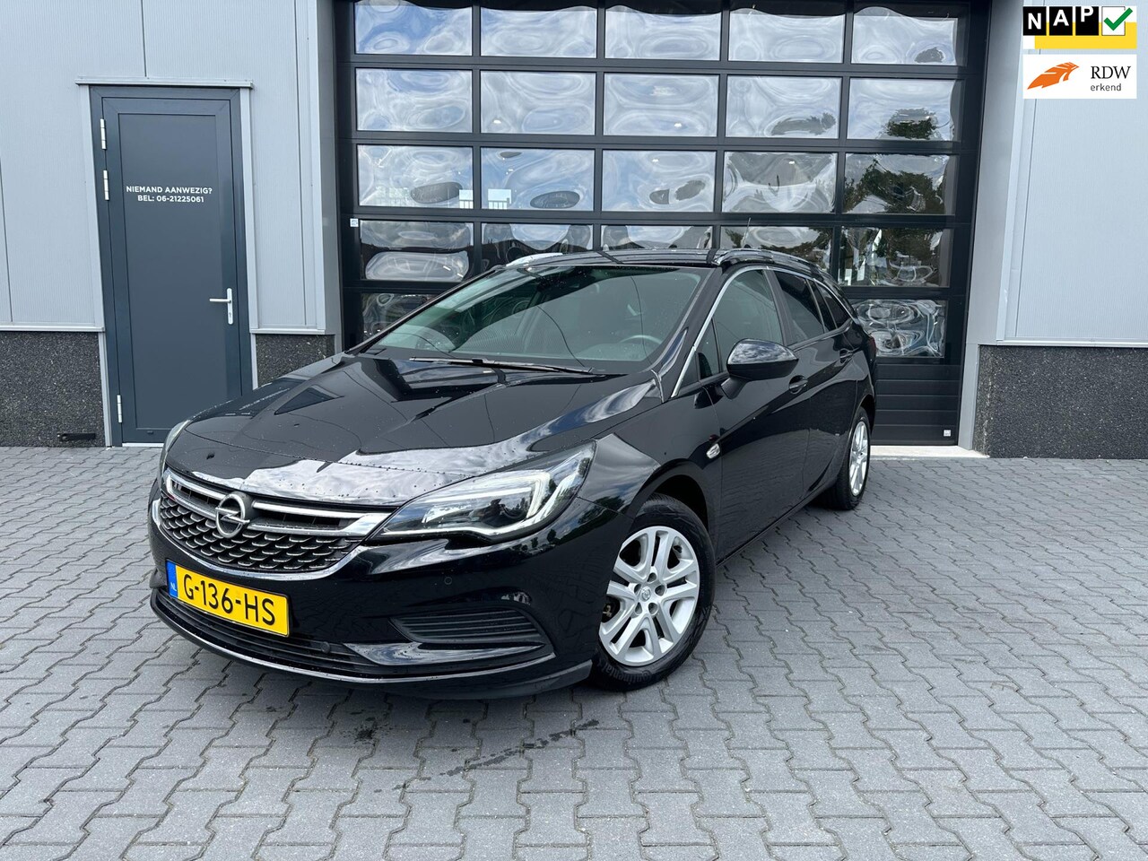 Opel Astra Sports Tourer - 1.4 Turbo Business 1.4 Turbo Business - AutoWereld.nl