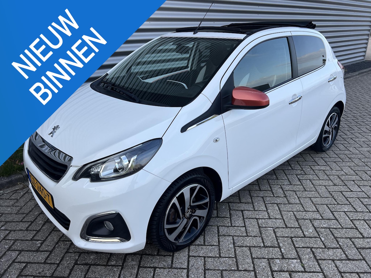 Peugeot 108 - 1.2 Puretech TOP! Roland Garros Cabrio Panorama - AutoWereld.nl