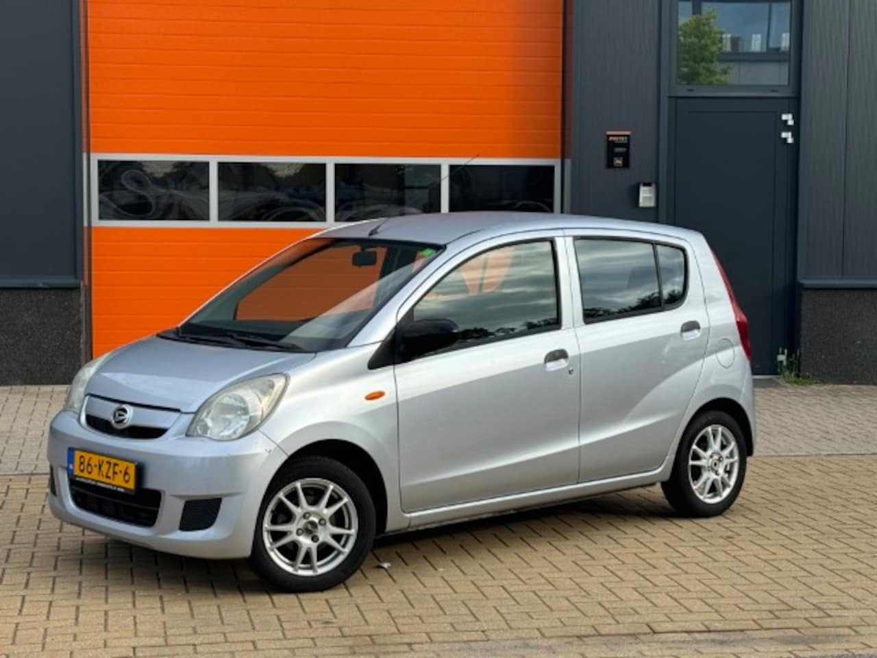 Daihatsu Cuore - 1.0 Comfort Airco 1.0 Comfort Airco - AutoWereld.nl