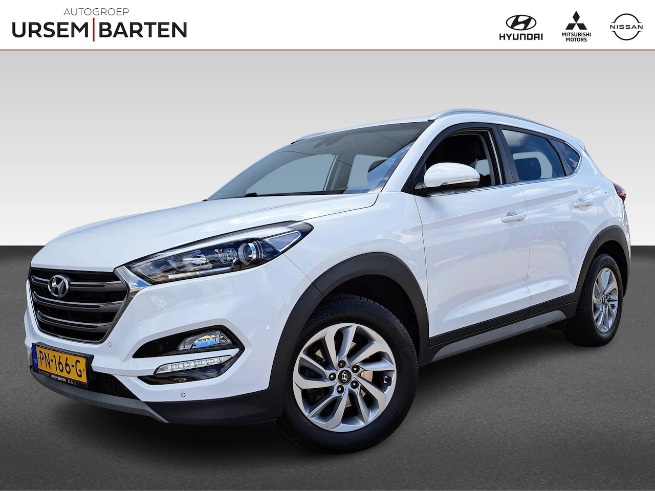 Hyundai Tucson - 1.6 GDi Comfort | Navigatie | Camera | Parkeersensoren - AutoWereld.nl