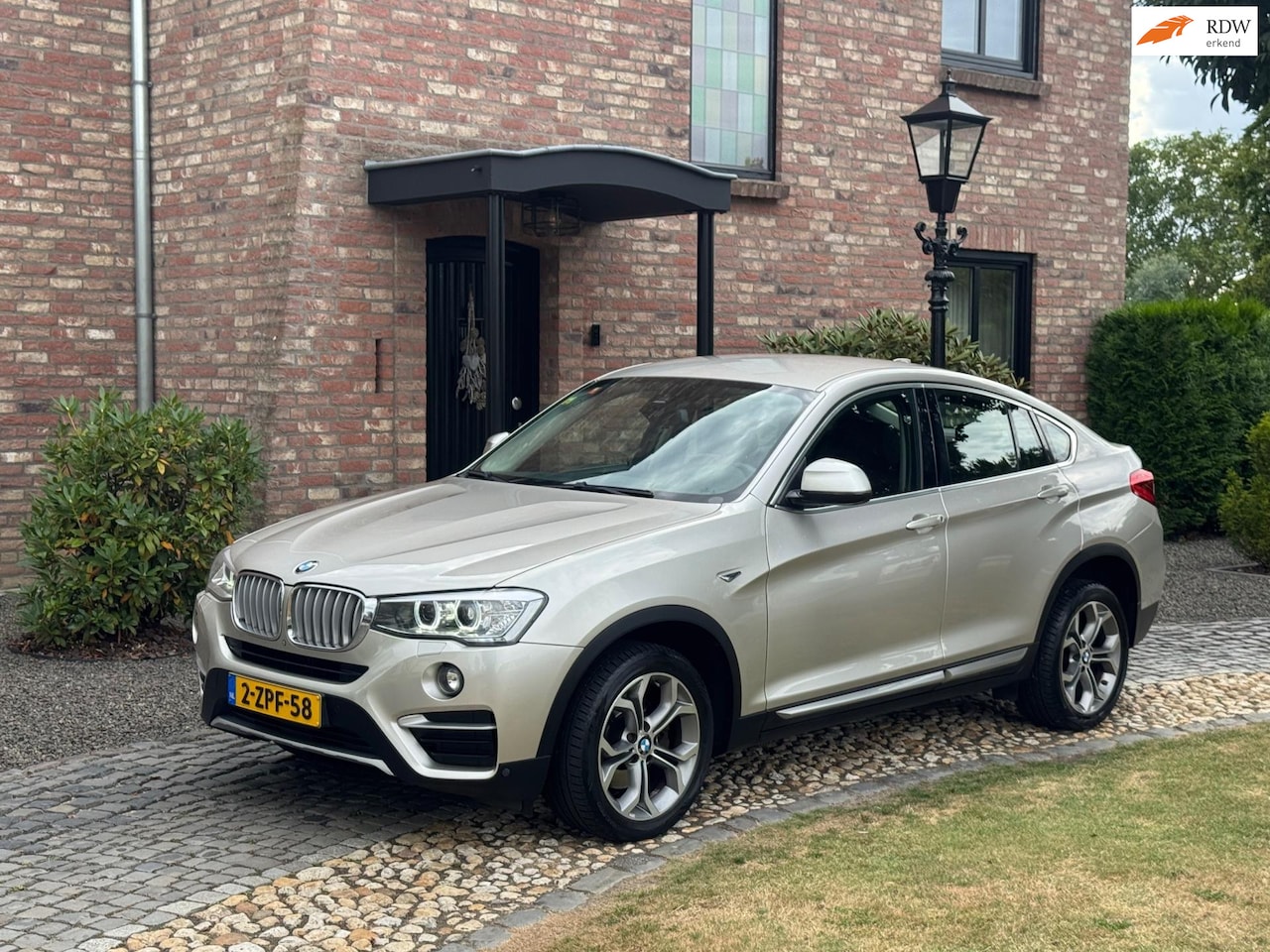 BMW X4 - XDrive20i High Executive HUD Leder - AutoWereld.nl