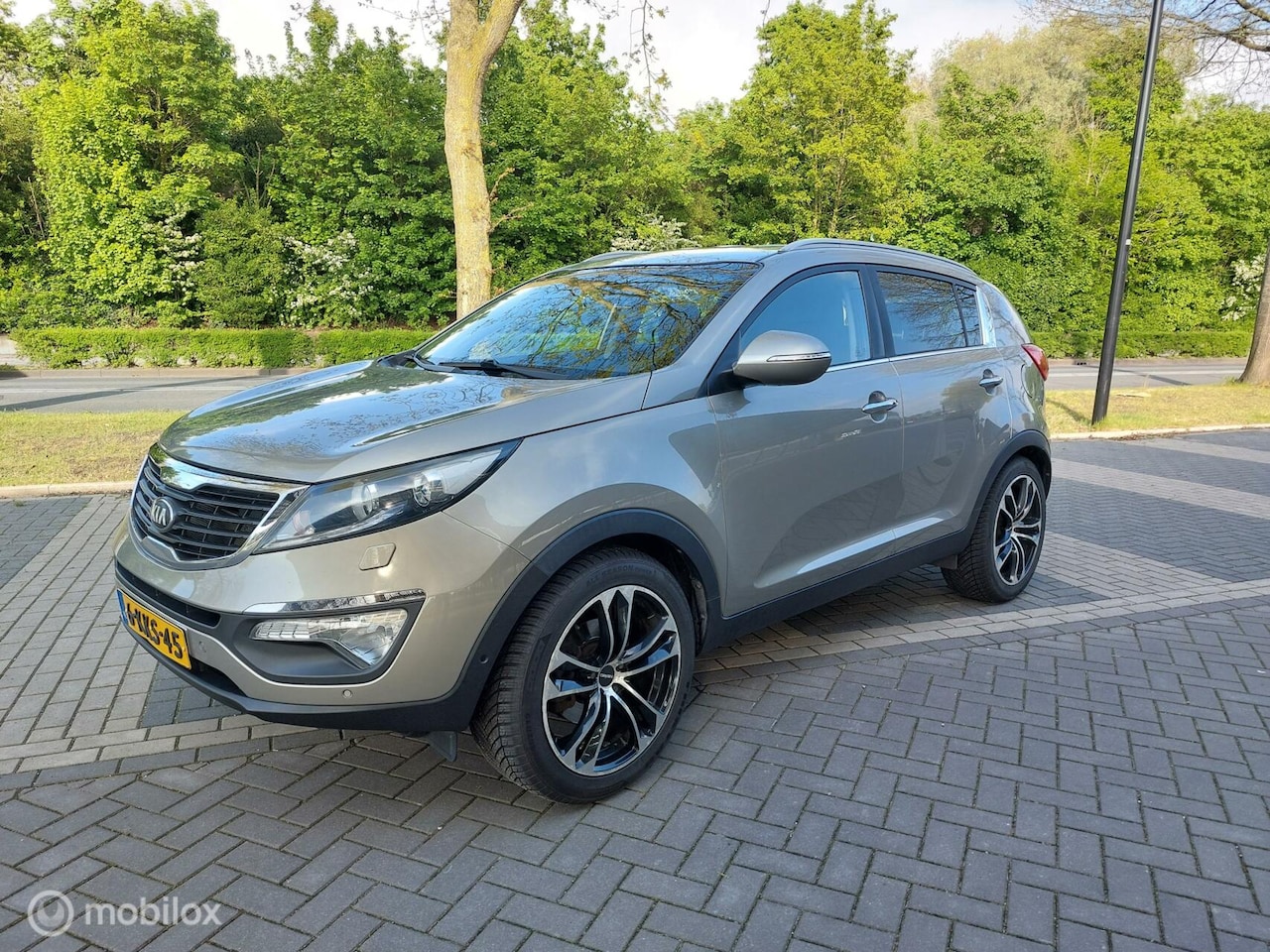 Kia Sportage - 1.6 GDI Super Pack Leder Clima NAP Trekhaak - AutoWereld.nl