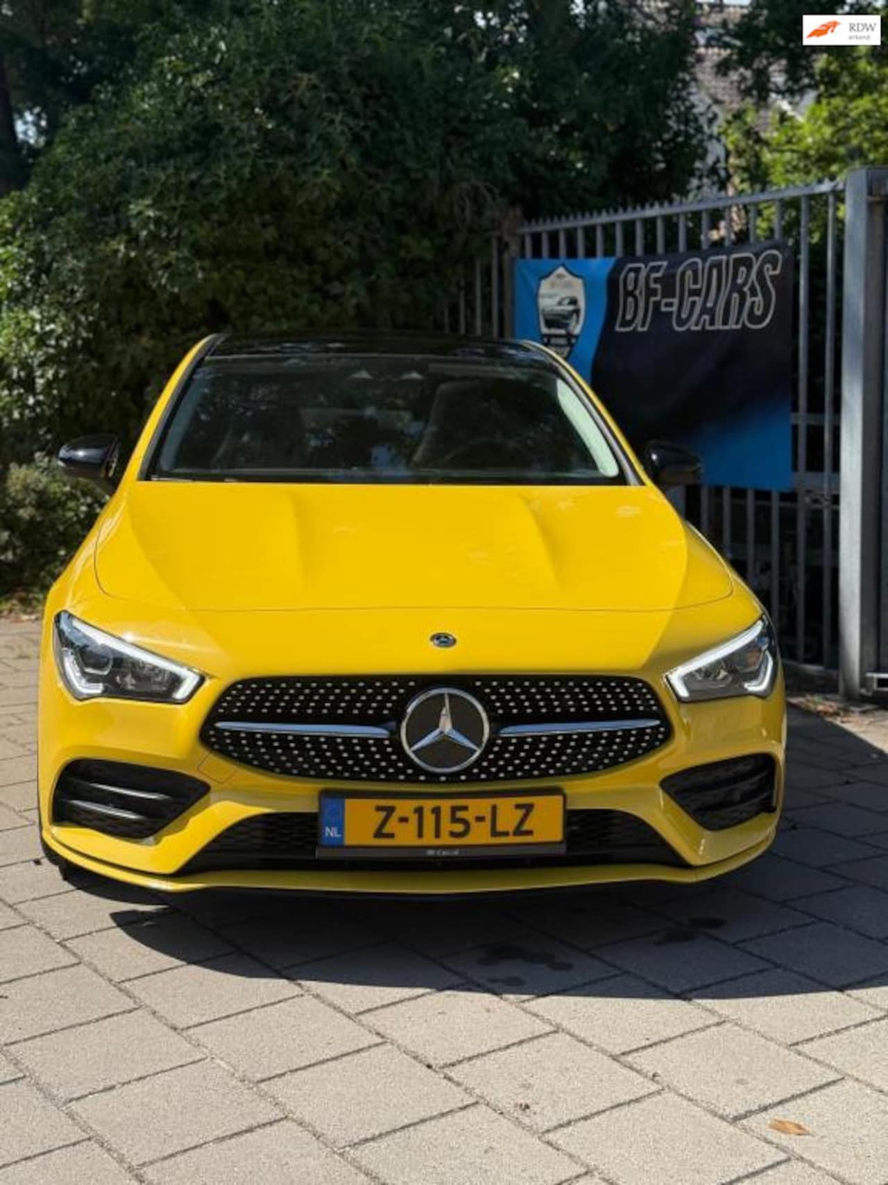 Mercedes-Benz CLA-Klasse - 180 AMG Line | Edition 1 | Panoramadak | Geel | 2019 - AutoWereld.nl