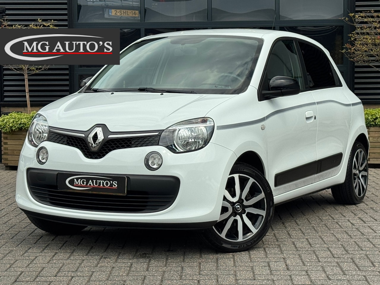 Renault Twingo - 1.0 SCe Limited | Airconditioning | Cruise Control | Parkeersensoren | Elektrische Spiegel - AutoWereld.nl
