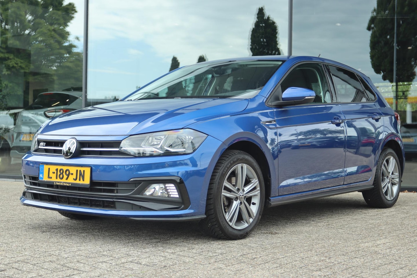 Volkswagen Polo - 1.0 TSI R-LINE AUT. | ADAPT. CRUISE | CAMERA | NAVI | PDC | DAB - AutoWereld.nl