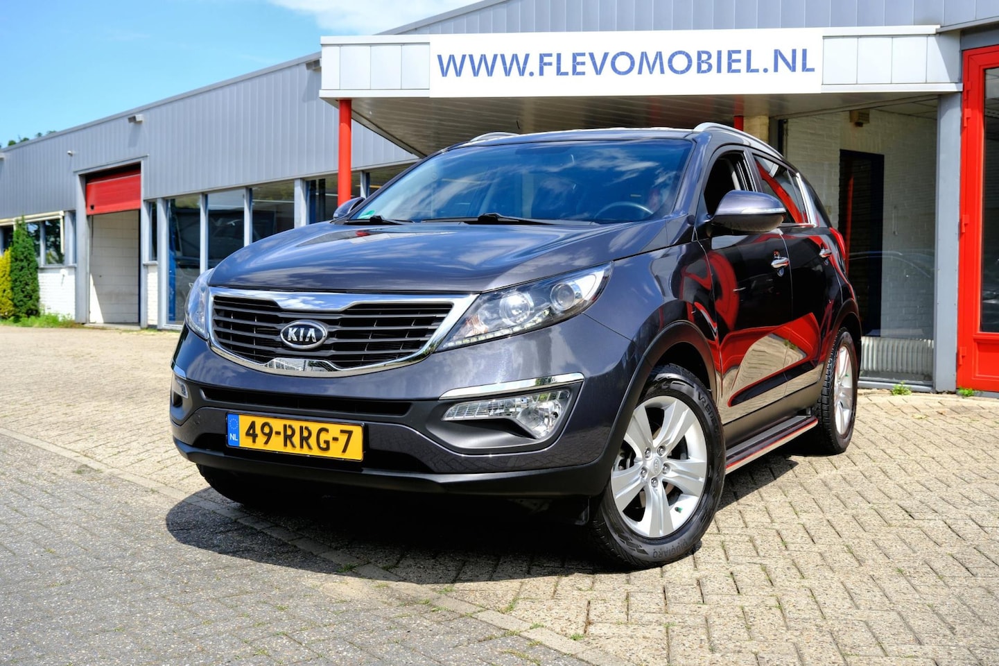 Kia Sportage - 2.0 163pk X-ecutive Plus Pack Aut. Clima|1e Eig|LMV|Half Leder - AutoWereld.nl