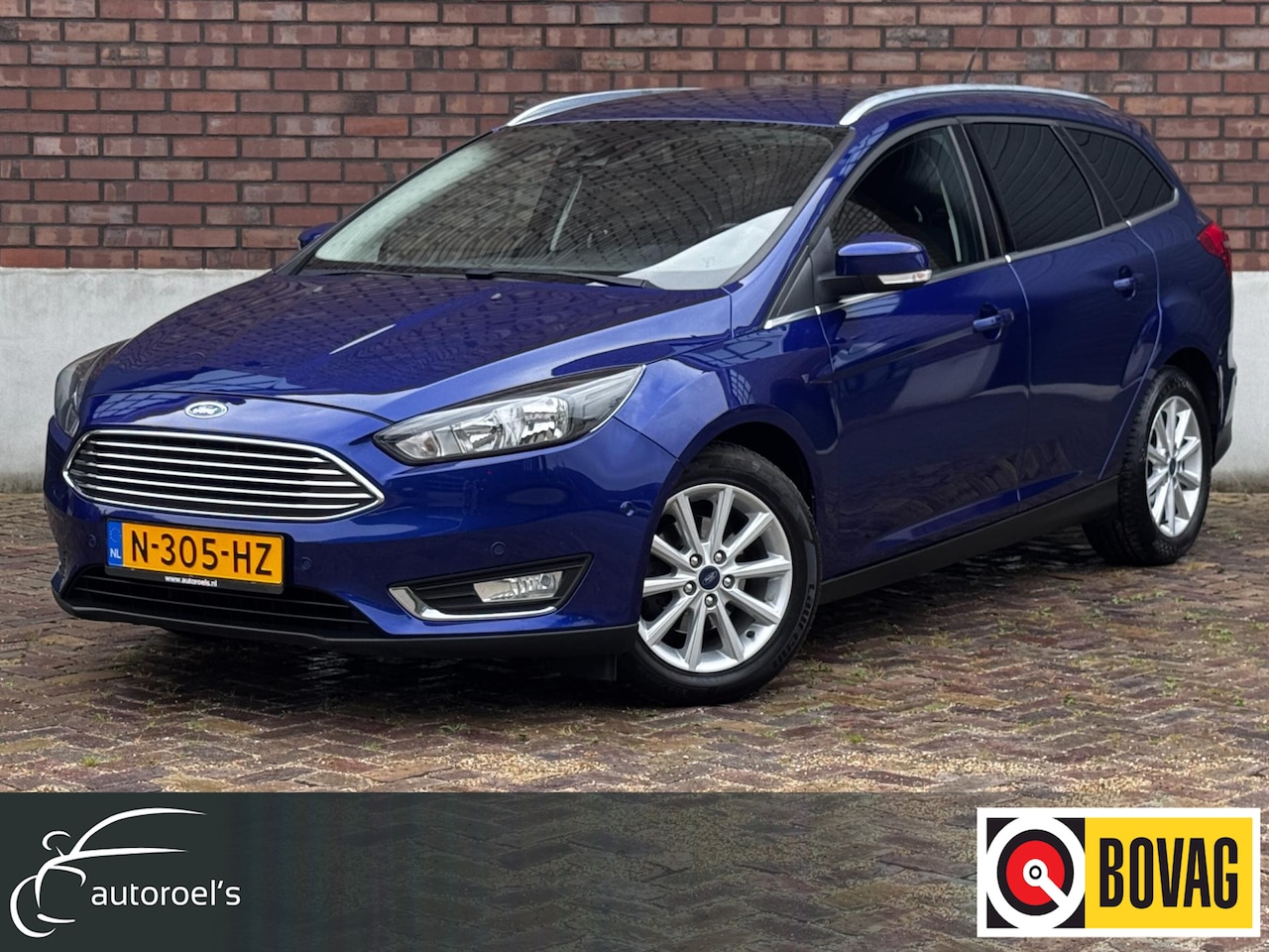 Ford Focus Wagon - 1.0 Titanium / 125 PK / Trekhaak / Navigatie / Climate Control / Stoel + Stuurverwarming / - AutoWereld.nl