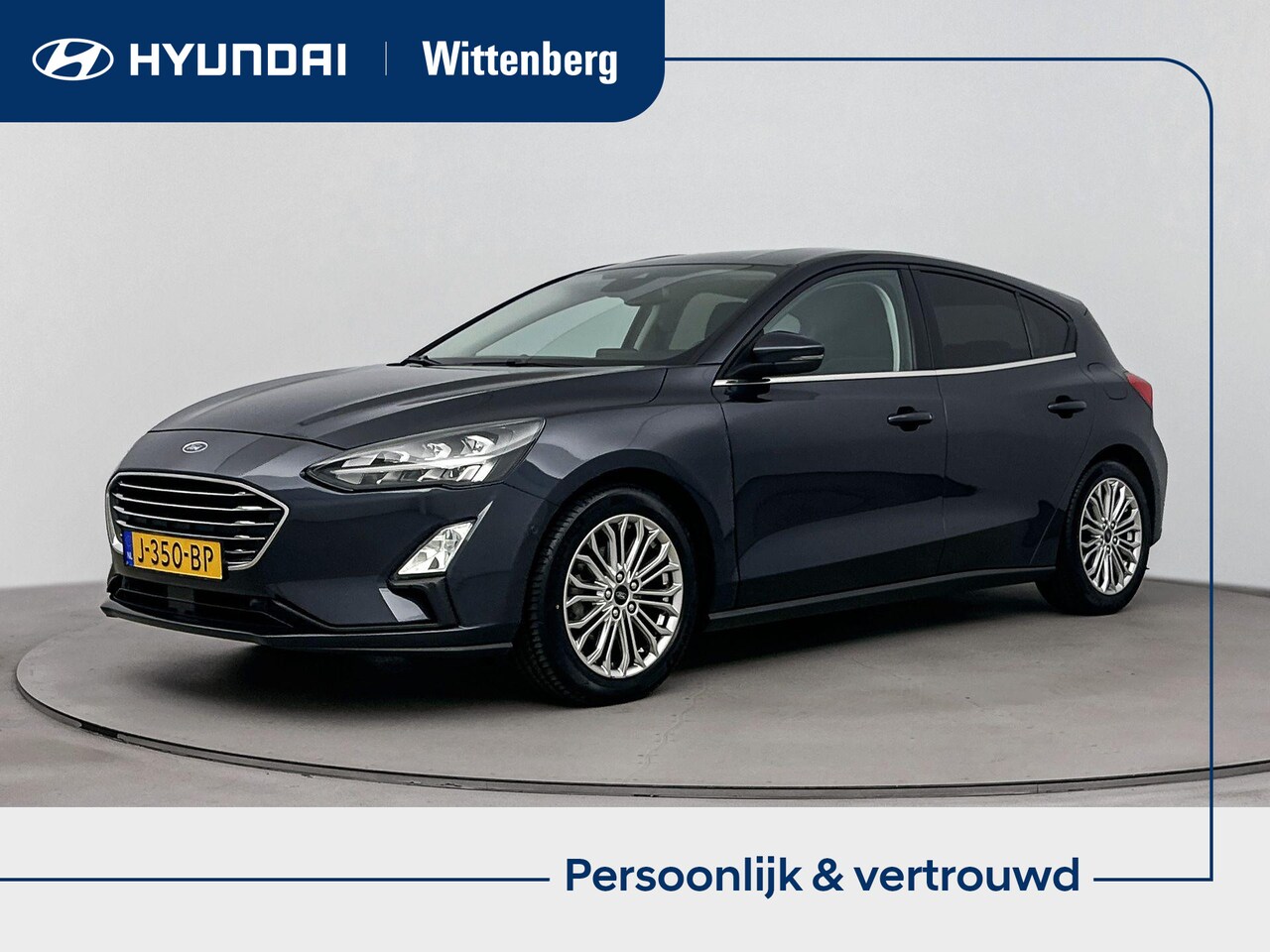 Ford Focus - 1.0 EcoBoost Titanium Business | Trekhaak | Winterpack | Navi | Cruise control | Camera | - AutoWereld.nl
