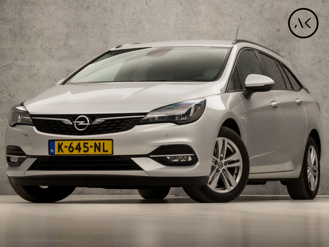 Opel Astra Sports Tourer - 1.4 Sport 146Pk Automaat (APPLE CARPLAY, NAVIGATIE, CLIMATE, CAMERA, GETINT GLAS, SPORTSTO - AutoWereld.nl