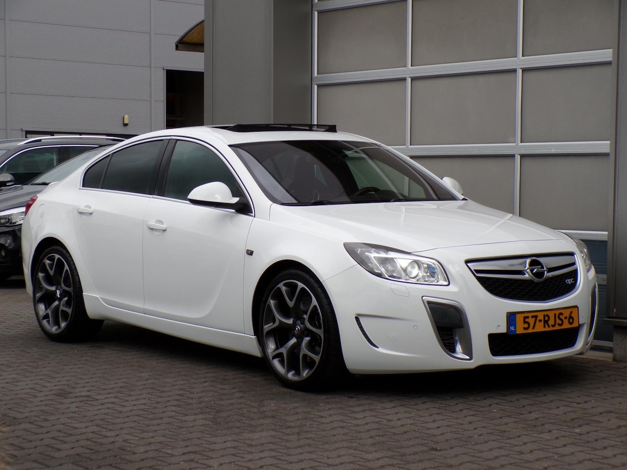 Opel Insignia - 2.8 T OPC 4x4|Xenon|Navi|Cruise|PDC|Dak|Trekh. - AutoWereld.nl