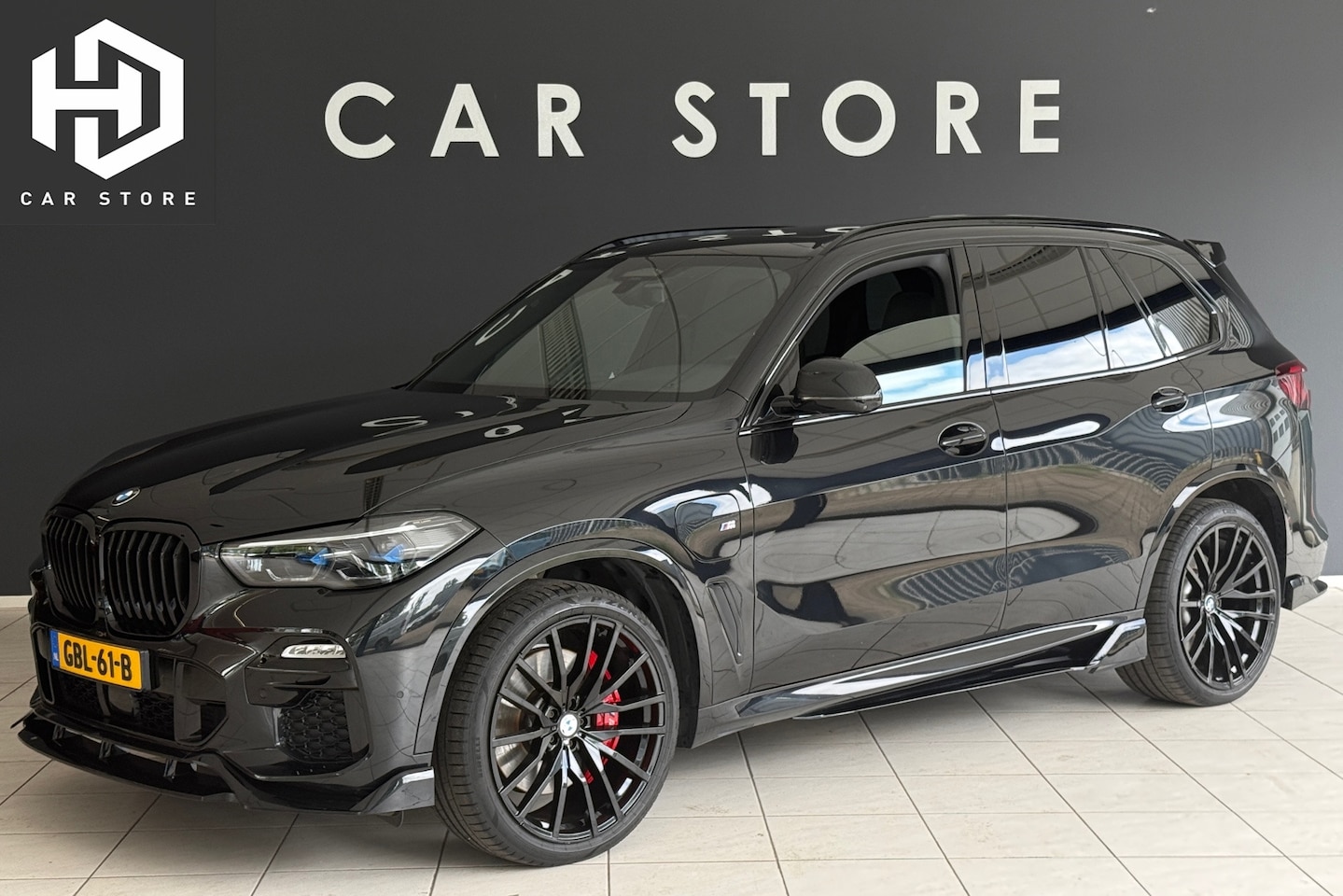 BMW X5 - XDrive45e M-Sport 4-Wielsturing|Carbon|B&W|Skylounge|Massage - AutoWereld.nl