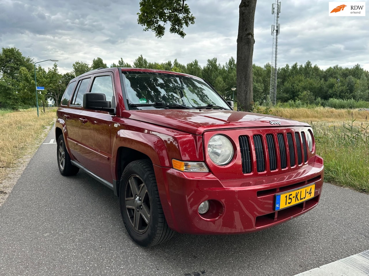 Jeep Patriot - 2.4 Limited Liberty *AUTOMAAT* - AutoWereld.nl