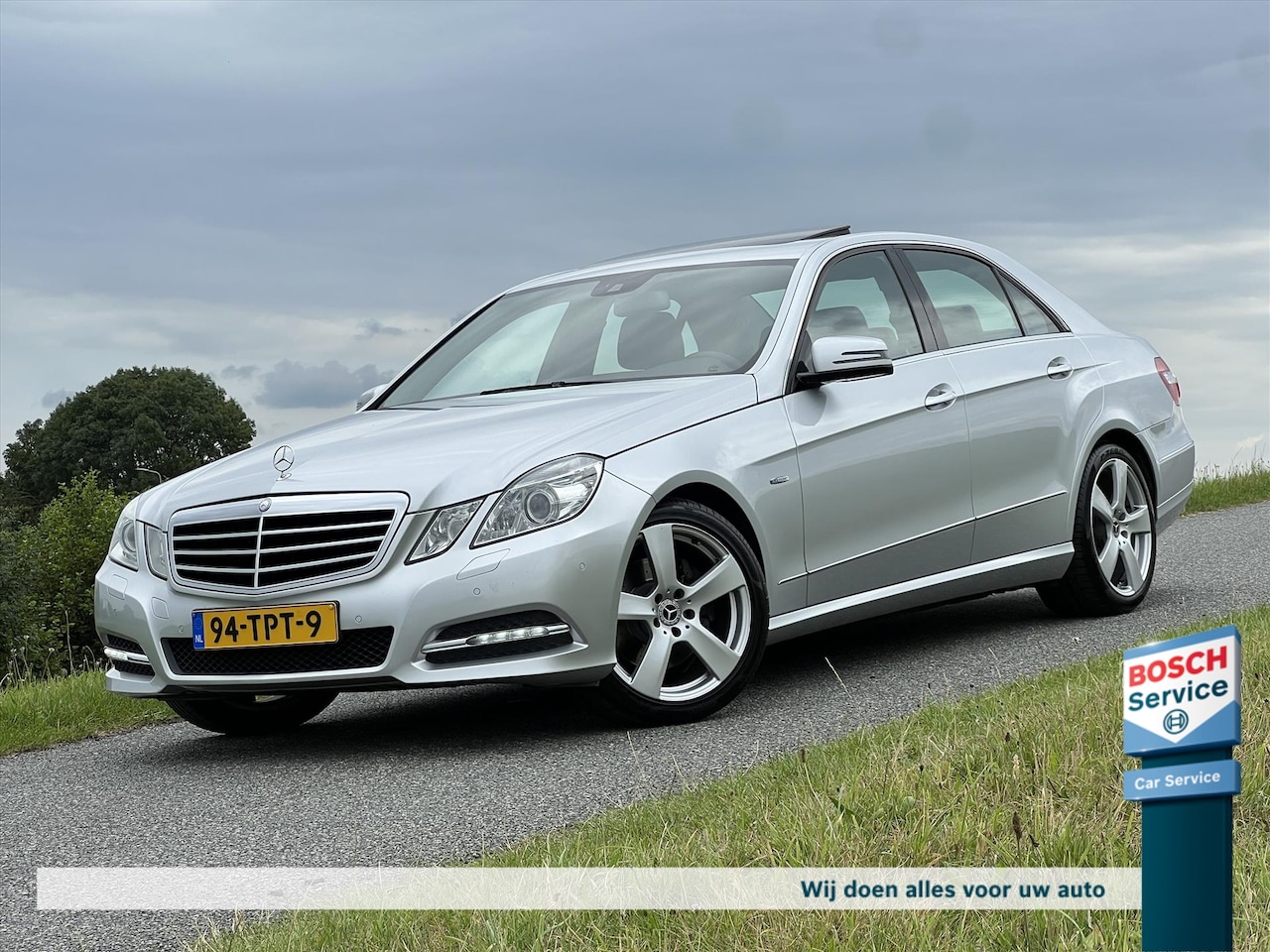 Mercedes-Benz E-klasse - E200 CGI Avantgarde / Schuif-kantel dak / Org NL / Navigatie / Cruise Control / Stoelverwa - AutoWereld.nl
