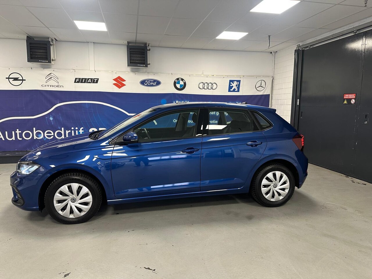 Volkswagen Polo - 1.0 TSI Go NAVI/CRUIS/CARPLAY/AIRCO - AutoWereld.nl