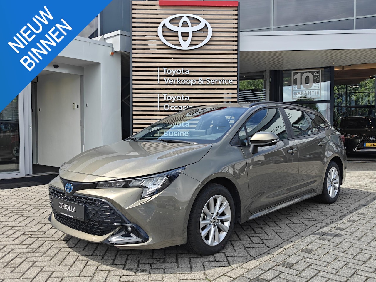 Toyota Corolla Touring Sports - Hybrid 140 Dynamic - AutoWereld.nl