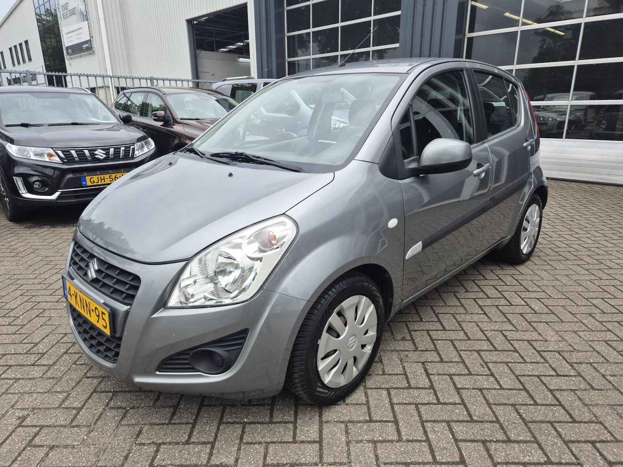 Suzuki Splash - 1.0 / dealer o.h. / 12 mnd garantie - AutoWereld.nl