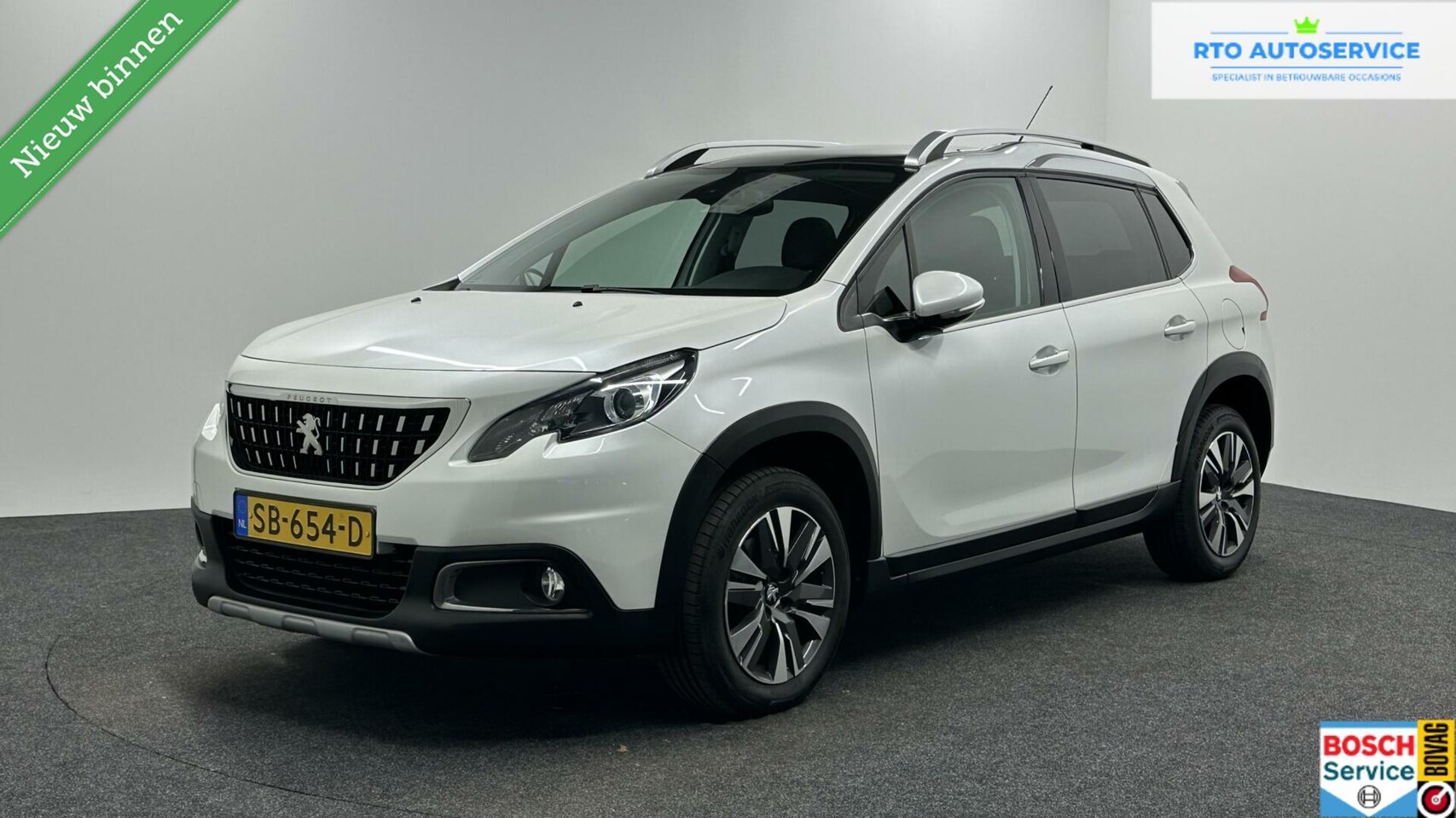 Peugeot 2008 - 1.2 PureTech Blue Lease Executive NAVI ECC LM CARPLAY. - AutoWereld.nl