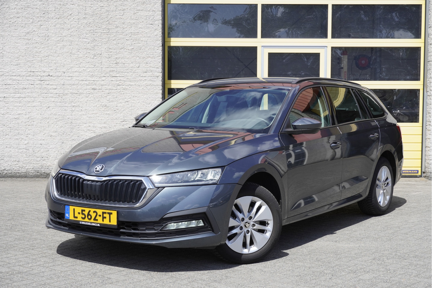 Skoda Octavia Combi - 1.0 TSI Business Edition BJ2021 Lmv 16" | Led | Pdc | Navi | Elek. achterklep | Dynamische - AutoWereld.nl