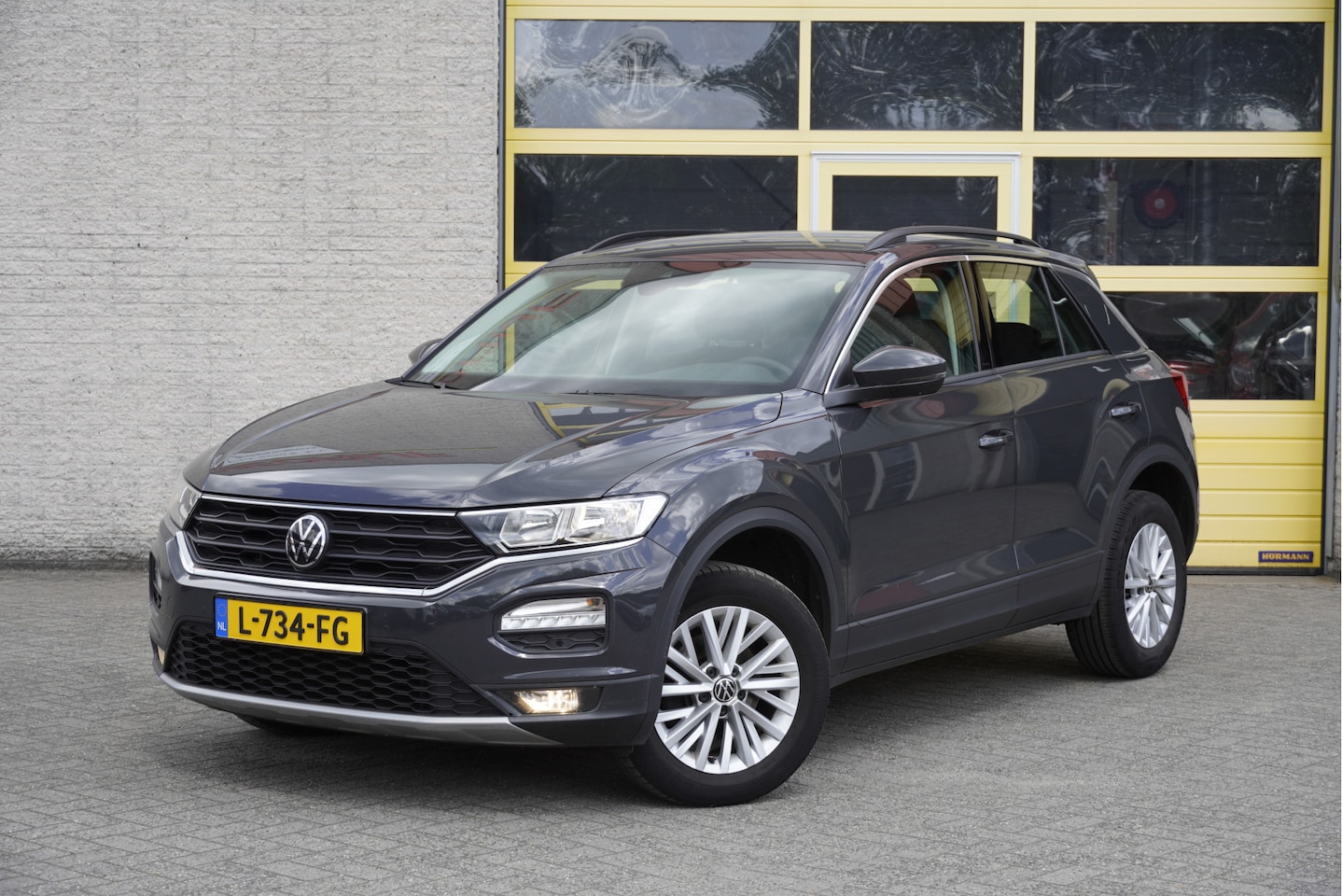 Volkswagen T-Roc - 1.0 TSI Style BJ2021 Lmv 16" | Led | Pdc | Navi | App-Connect | Airco | Cruise control | G - AutoWereld.nl