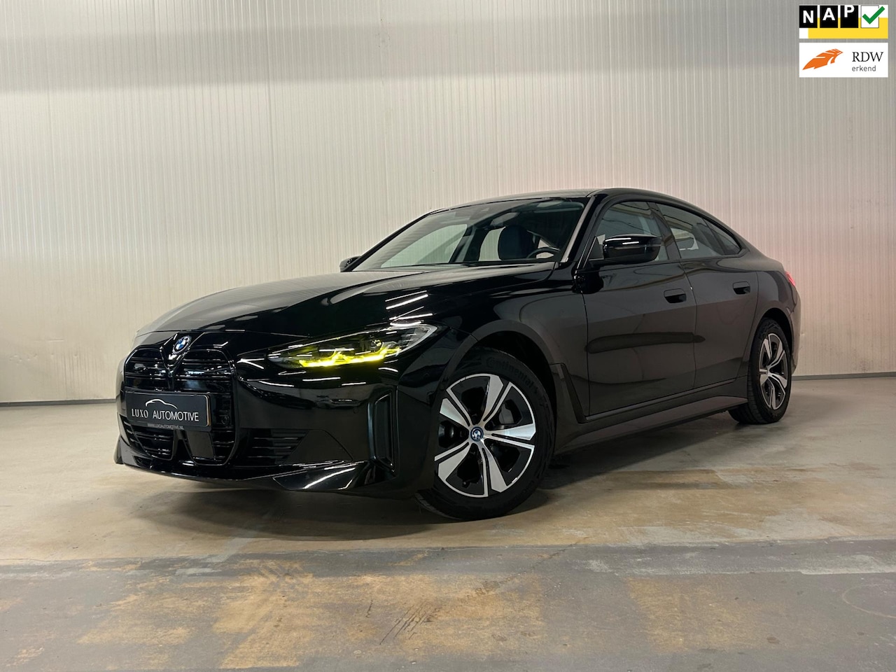 BMW i4 - EDrive40 84 kWh | NAP | SHADOW LINE | DEALERGARANTIE | LASERLIGHTS - AutoWereld.nl
