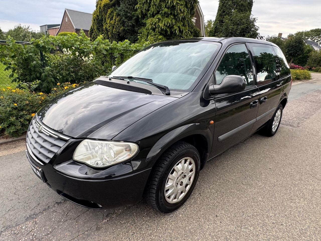 Chrysler Voyager - 2.4i Business Edition Airco Cruise 7 Persoons - AutoWereld.nl