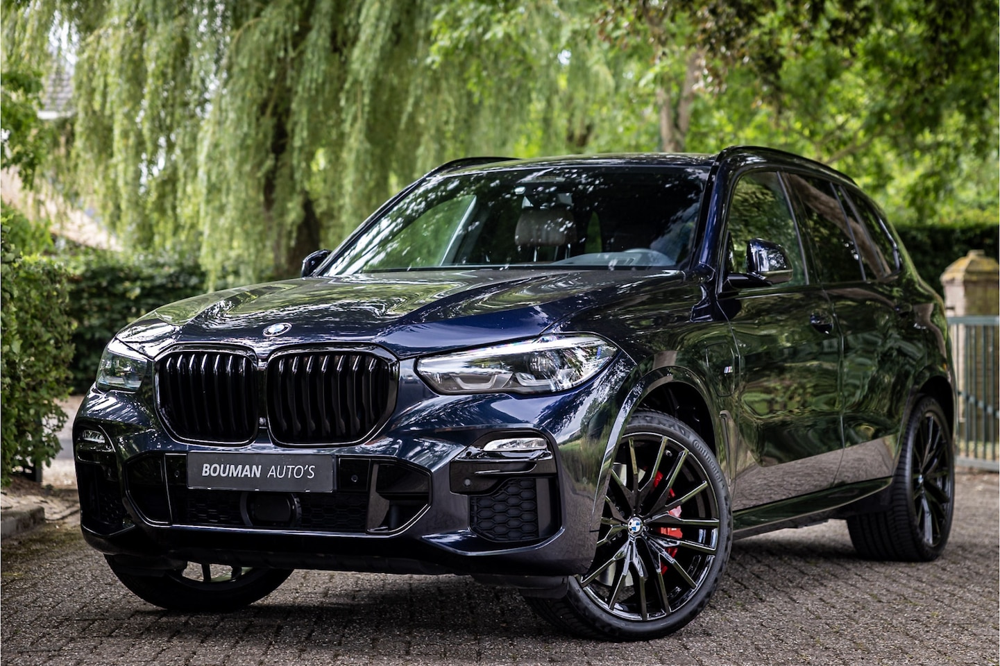 BMW X5 - xDrive45e M Sport Sky Lounge Pano 22" Harman Kardon HUD ACC - AutoWereld.nl