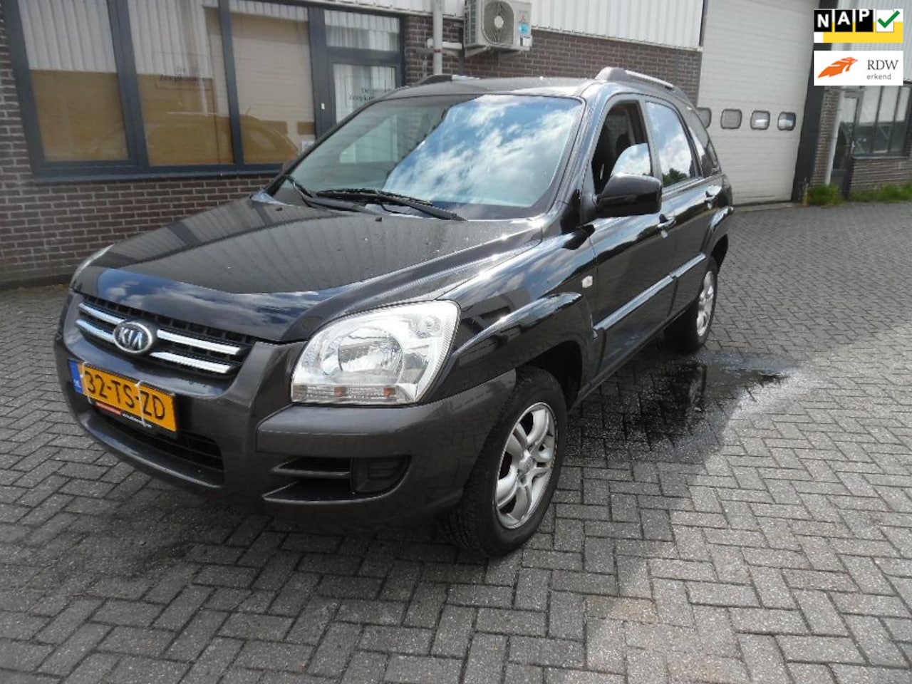 Kia Sportage - 2.0 CVVT Executive 2.0 CVVT Executive - AutoWereld.nl