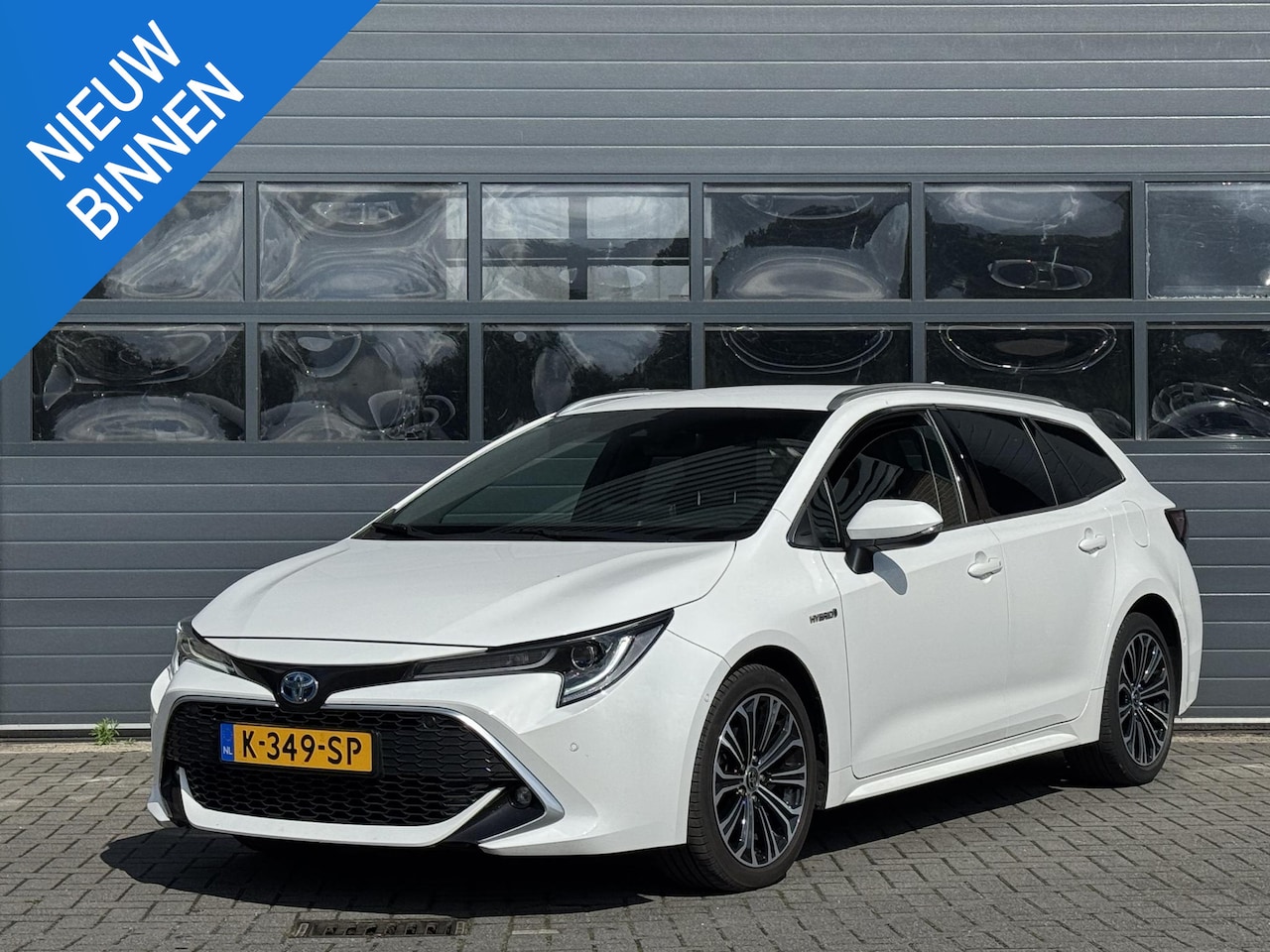 Toyota Corolla Touring Sports - 1.8 HYBRID EXECUTIVE I AUTOMAAT I ADAPTIVE CRUISE CONTROL I ALCANTARA BEKLEDING I APPLE CA - AutoWereld.nl