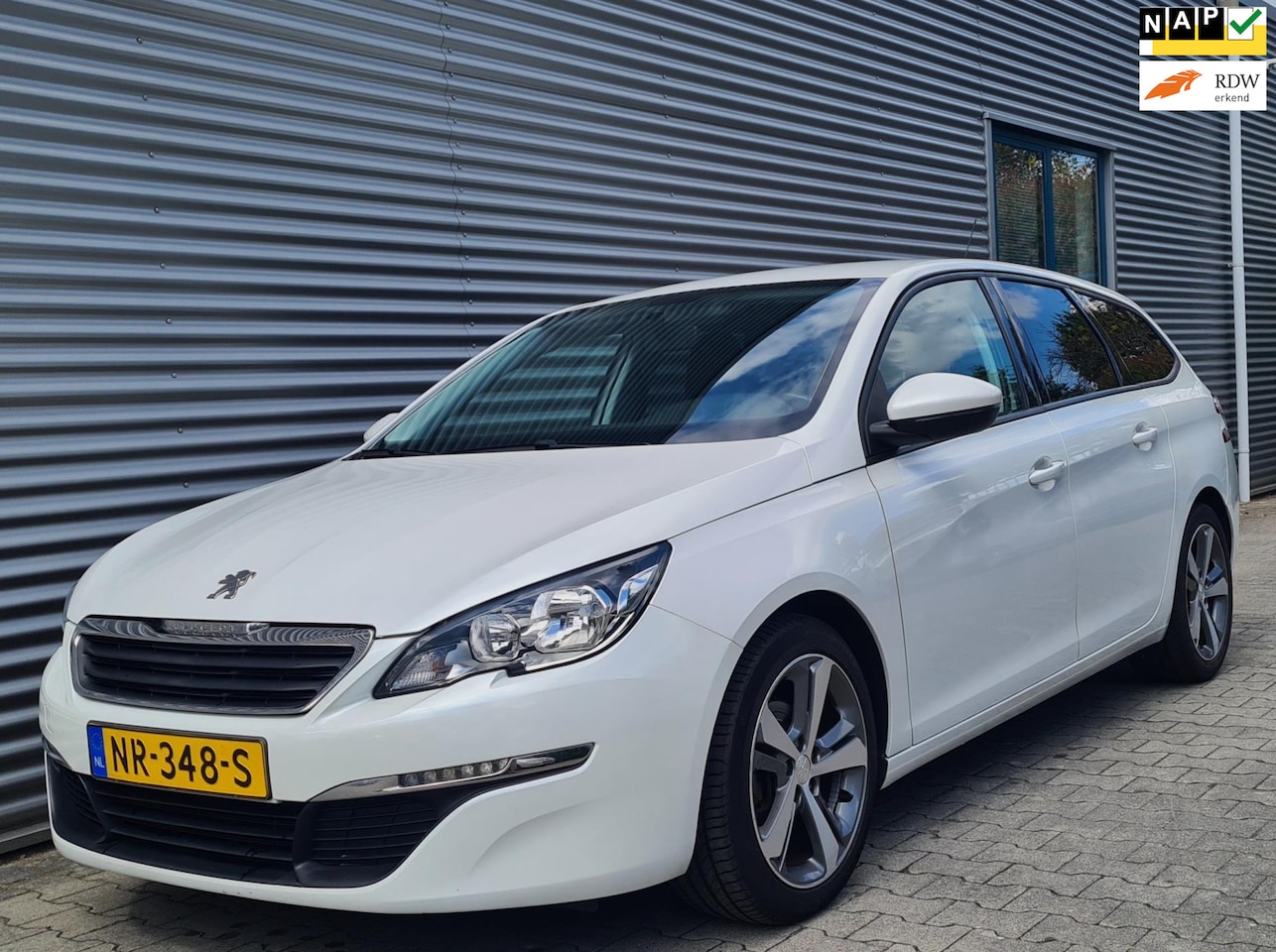 Peugeot 308 SW - 1.2 PureTech Blue Lease 03-2017 Pearl White - AutoWereld.nl