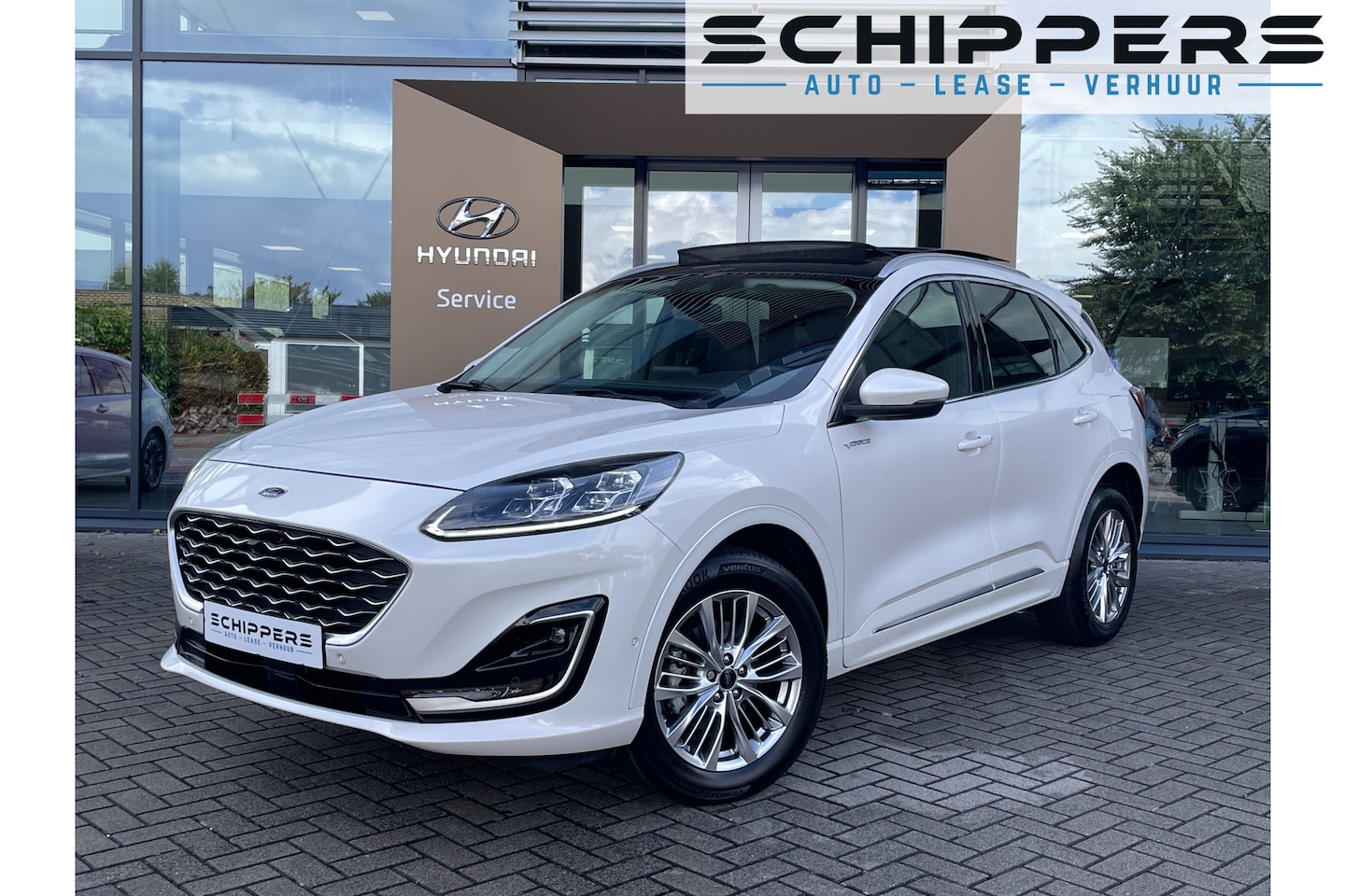 Ford Kuga - 2.5 HEV Vignale | glazen schuif-kanteldak | Winterpakket | Hybrid - AutoWereld.nl