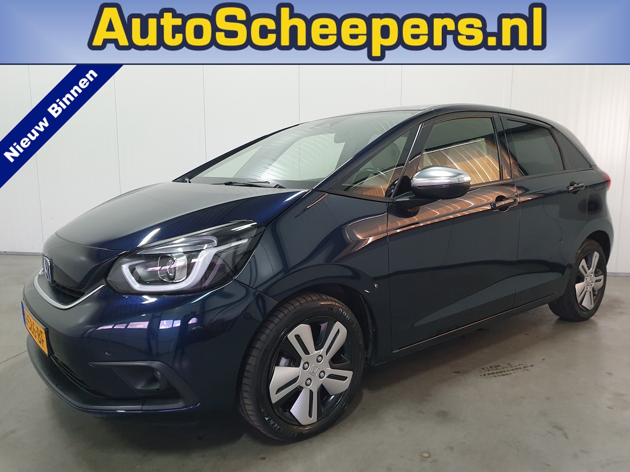 Honda Jazz - 1.5 e:HEV Executive NAVI/CRUISE/AIRCO/LMV - AutoWereld.nl