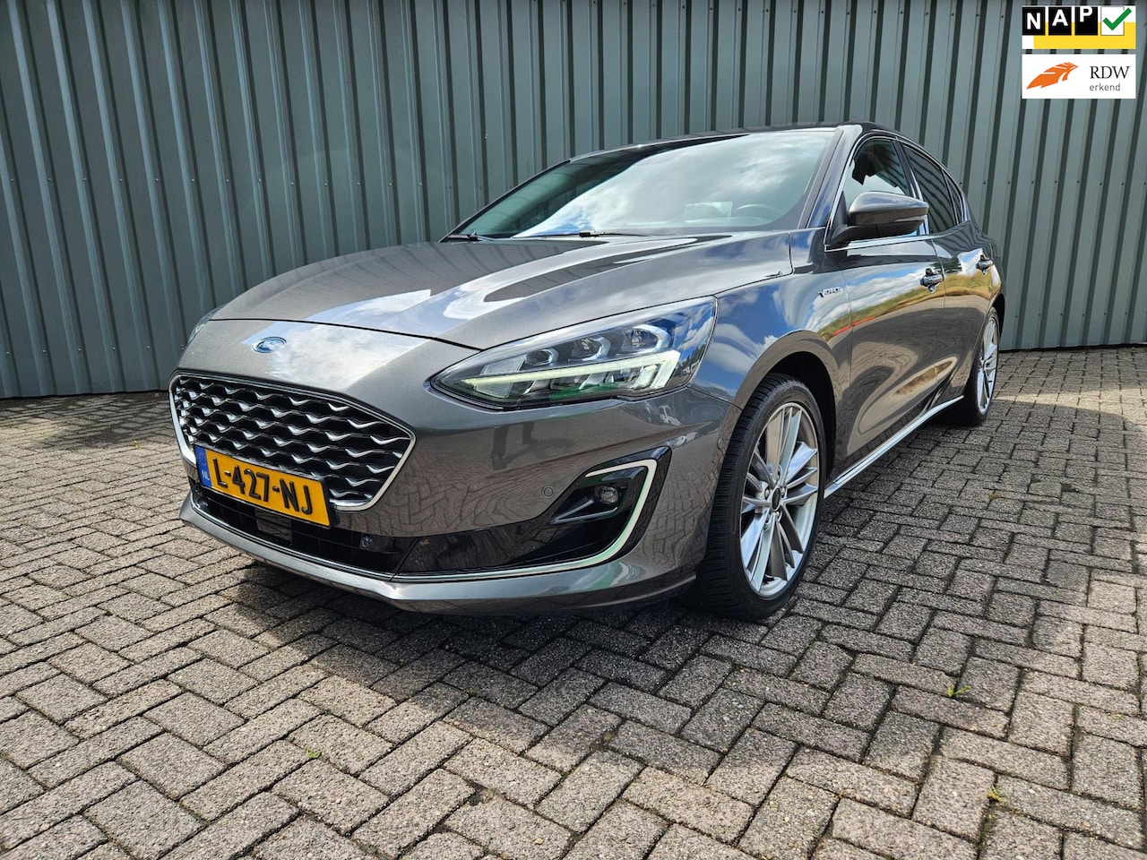 Ford Focus - 1.0 EcoBoost Hybrid Vignale Vol Leder Navi Stoelverwarming - AutoWereld.nl