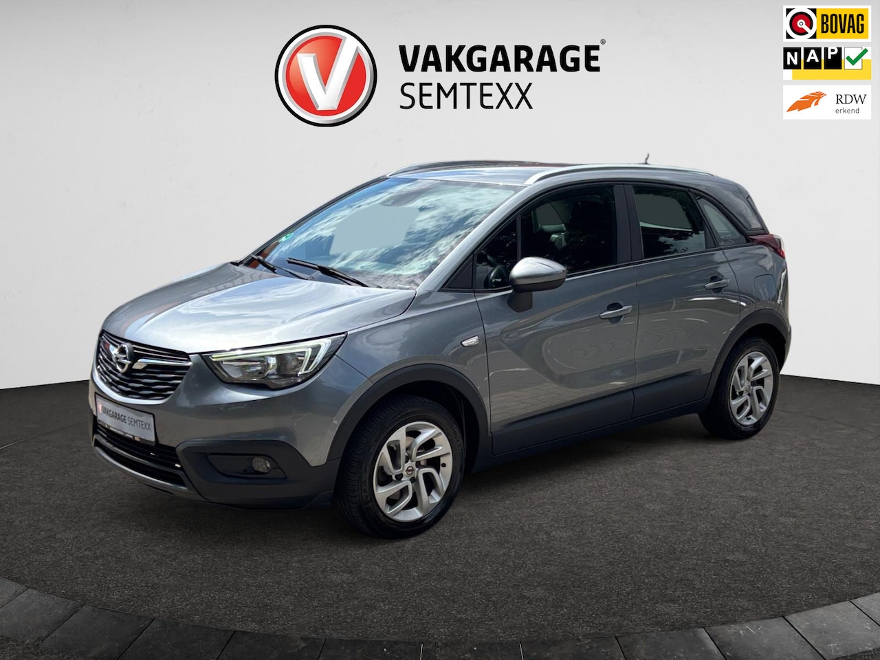 Opel Crossland X - 1.2 Turbo Innovation | Automaat | Cruise | Navi | Airco | Dakrail | Slechts 46.000 KM | Or - AutoWereld.nl