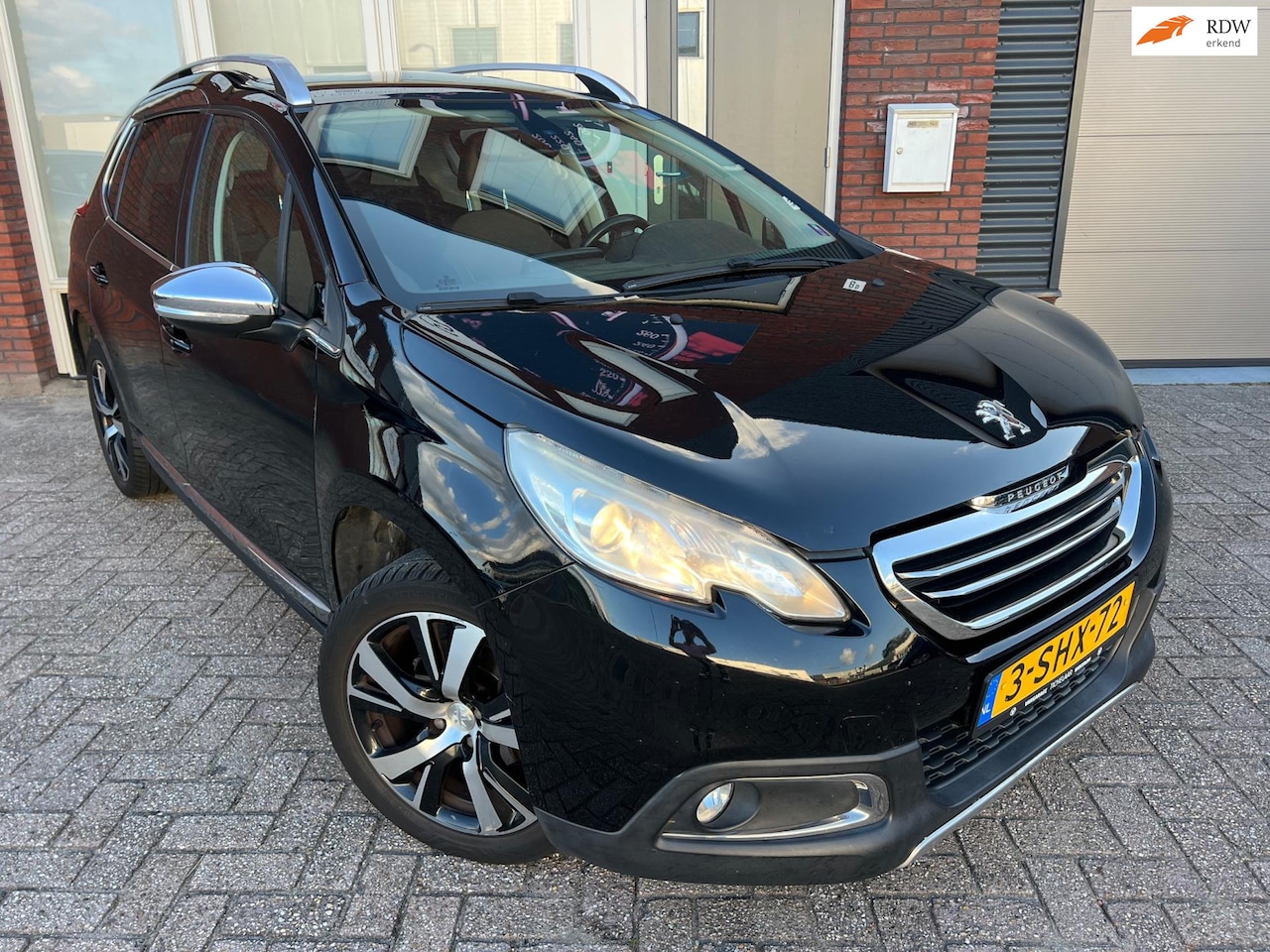 Peugeot 2008 - 1.6 VTi Féline / Pano / Leder / Navi / PDC / Cruise - AutoWereld.nl