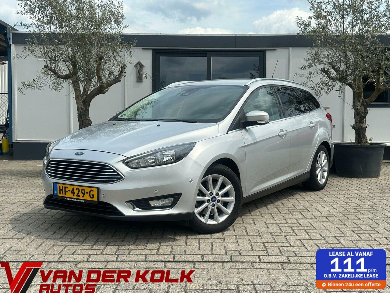 Ford Focus Wagon - 1.5 Titanium Navi LED Cruise Climate Stuur/Stoelverwarming Sensoren - AutoWereld.nl