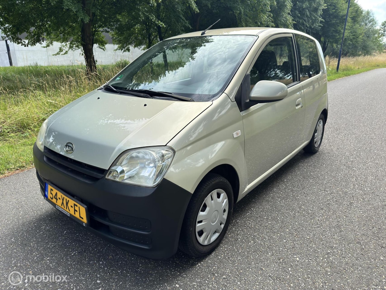 Daihatsu Cuore - 1.0-12V Nagano*AUTOMAAT*NEW APK 07/26 - AutoWereld.nl