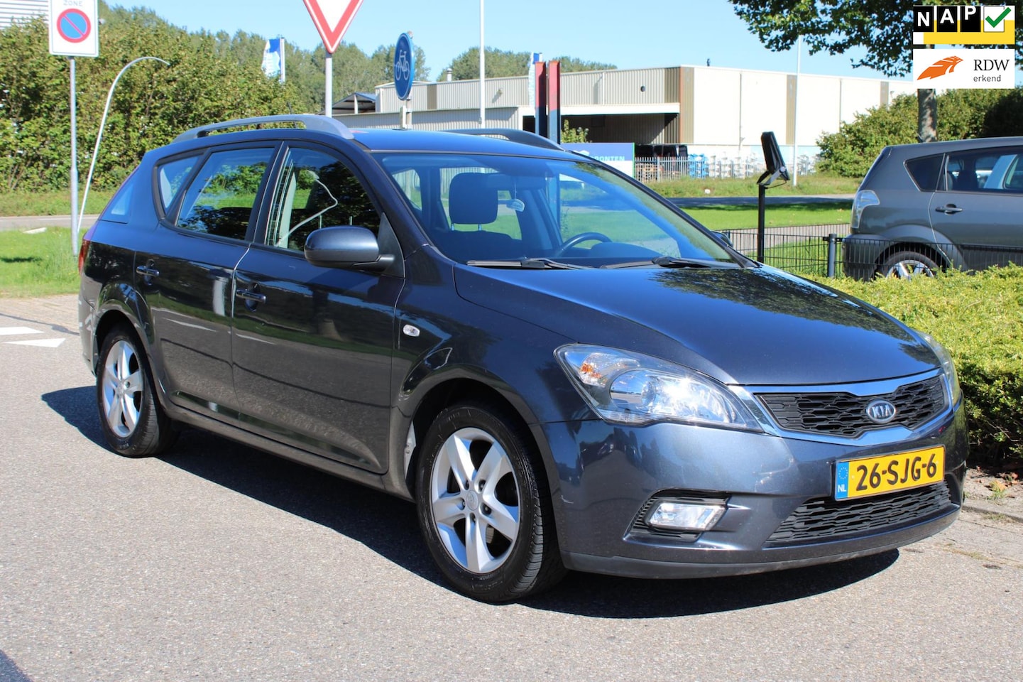 Kia Cee'd Sporty Wagon - 1.4 CVVT SEVEN-uitv/AIRCO/LM-VELG/AUX+Ipod+USB/CRUISE CONTROL/DAKRAILS/2e EIGENAAR/nieuwe - AutoWereld.nl